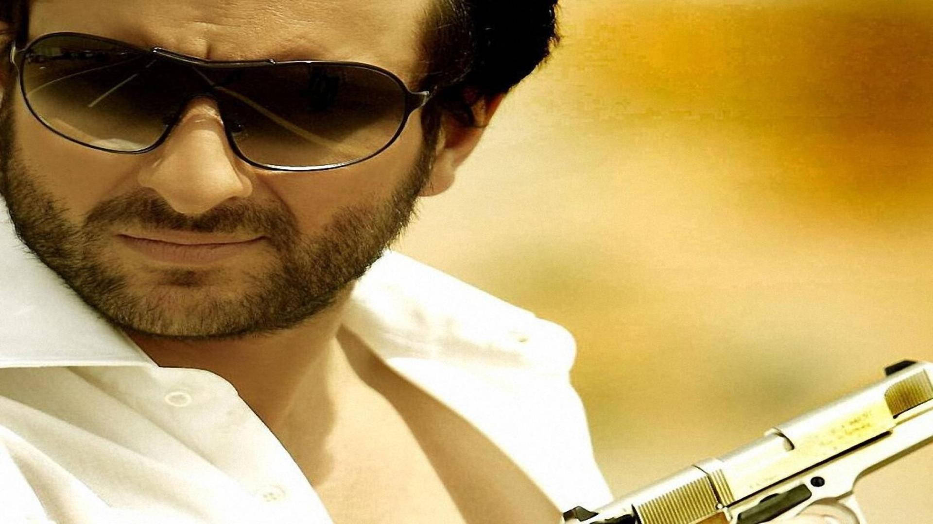 Saif Ali Khan, silver pistol, warm golden background, Full HD Desktop Wallpaper