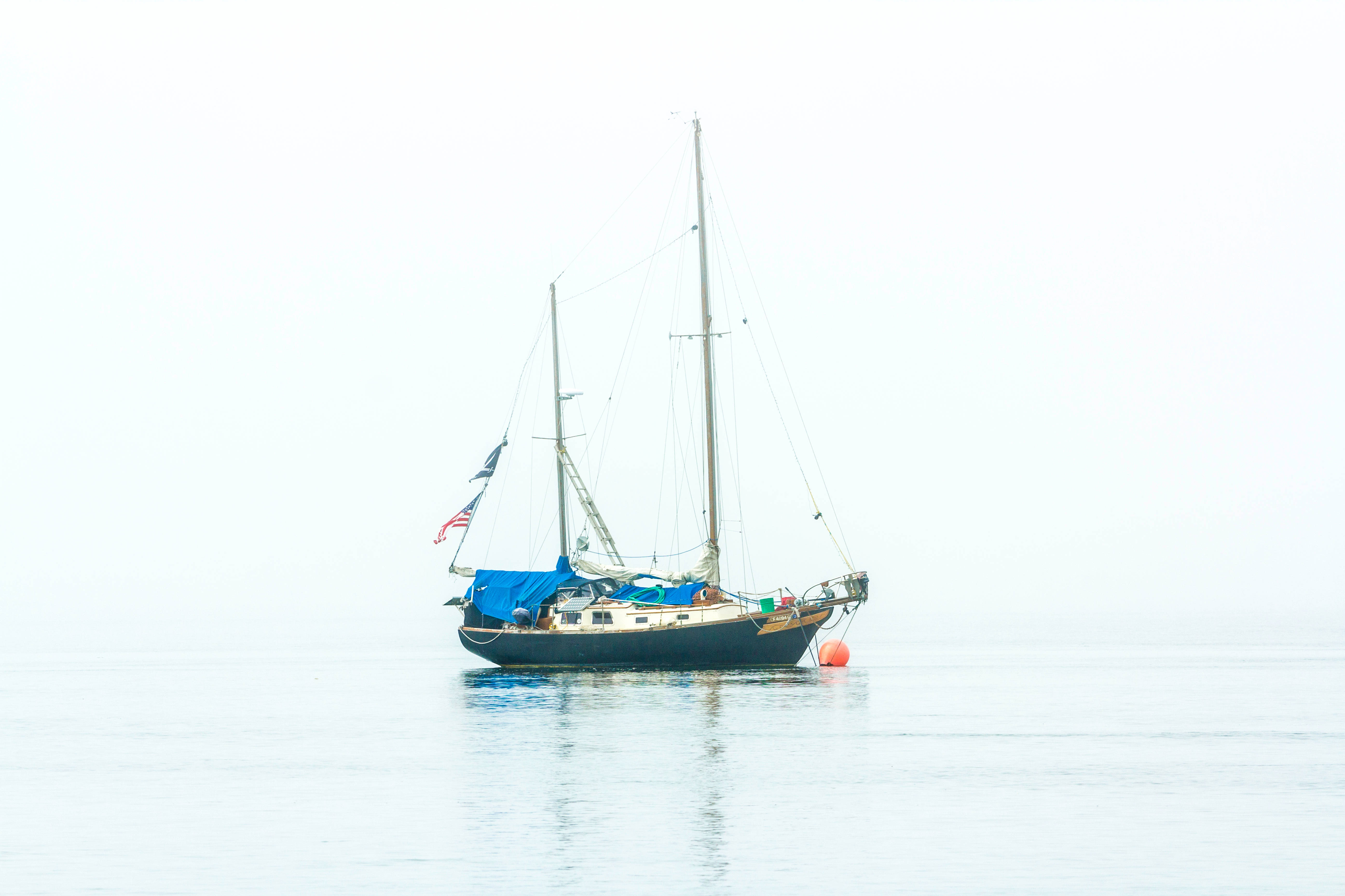 sailing boat, blue cover, calm gray waters, 5K Desktop Wallpaper