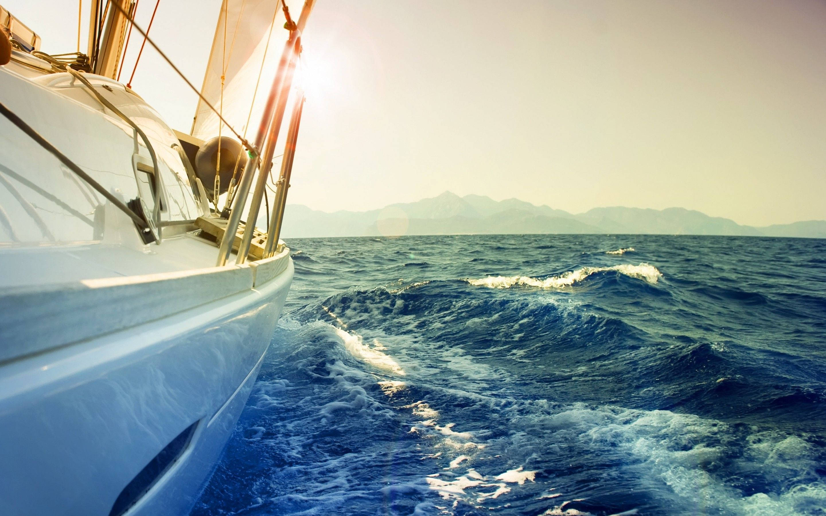 sailing boat, hull side, deep blue waves, 2K Desktop Wallpaper