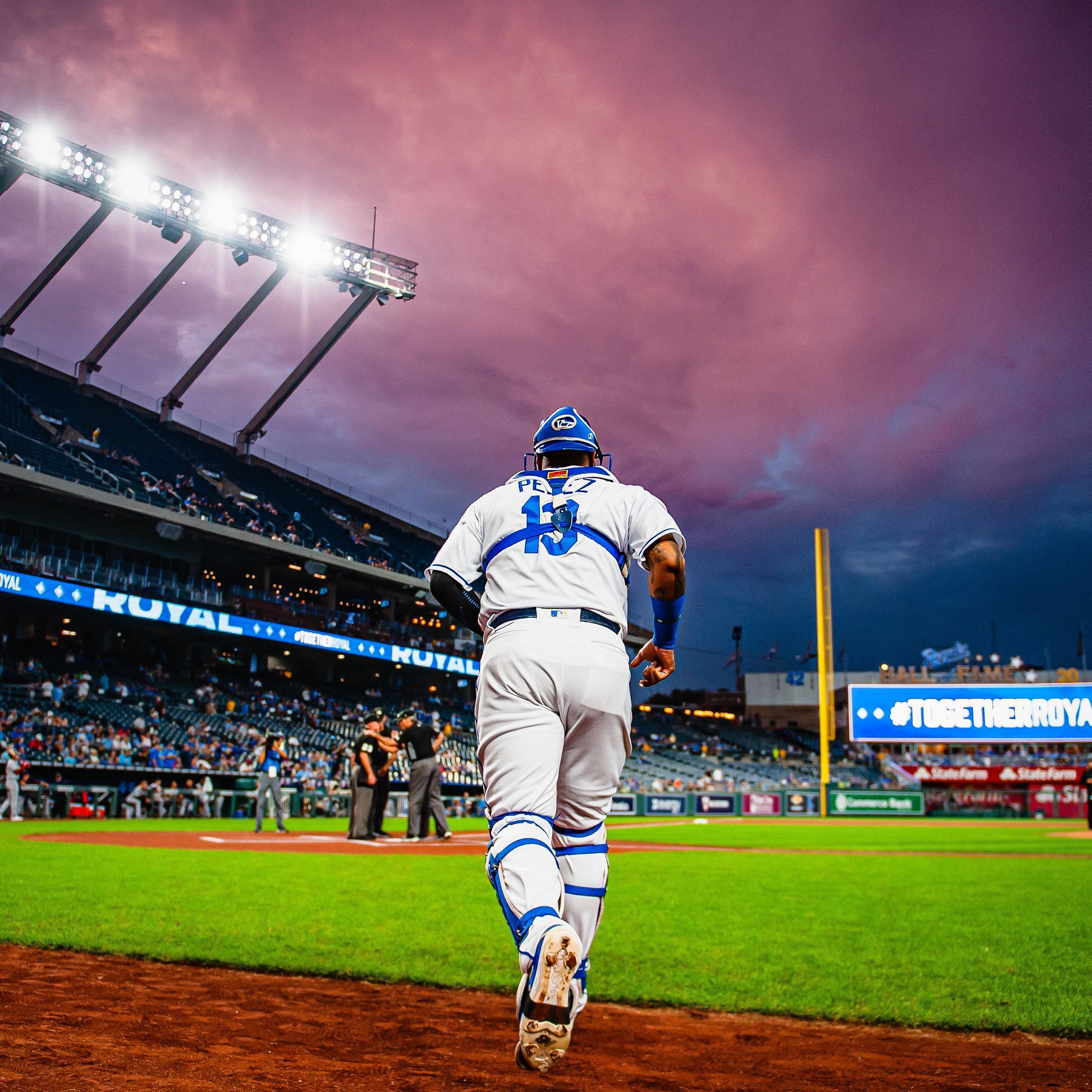 Salvador Perez, white and blue uniform, vibrant green field, 2K Desktop Wallpaper