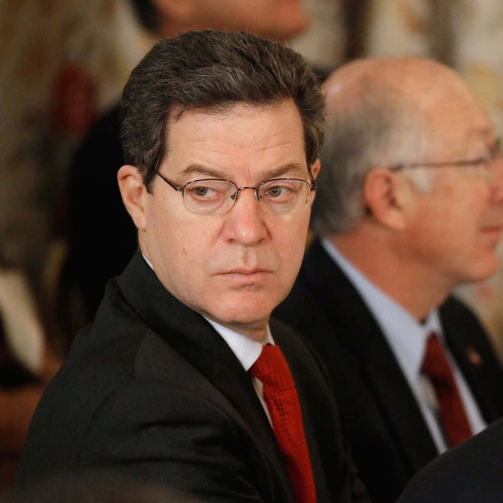 Sam Brownback, black suit, red tie, SD Desktop Wallpaper