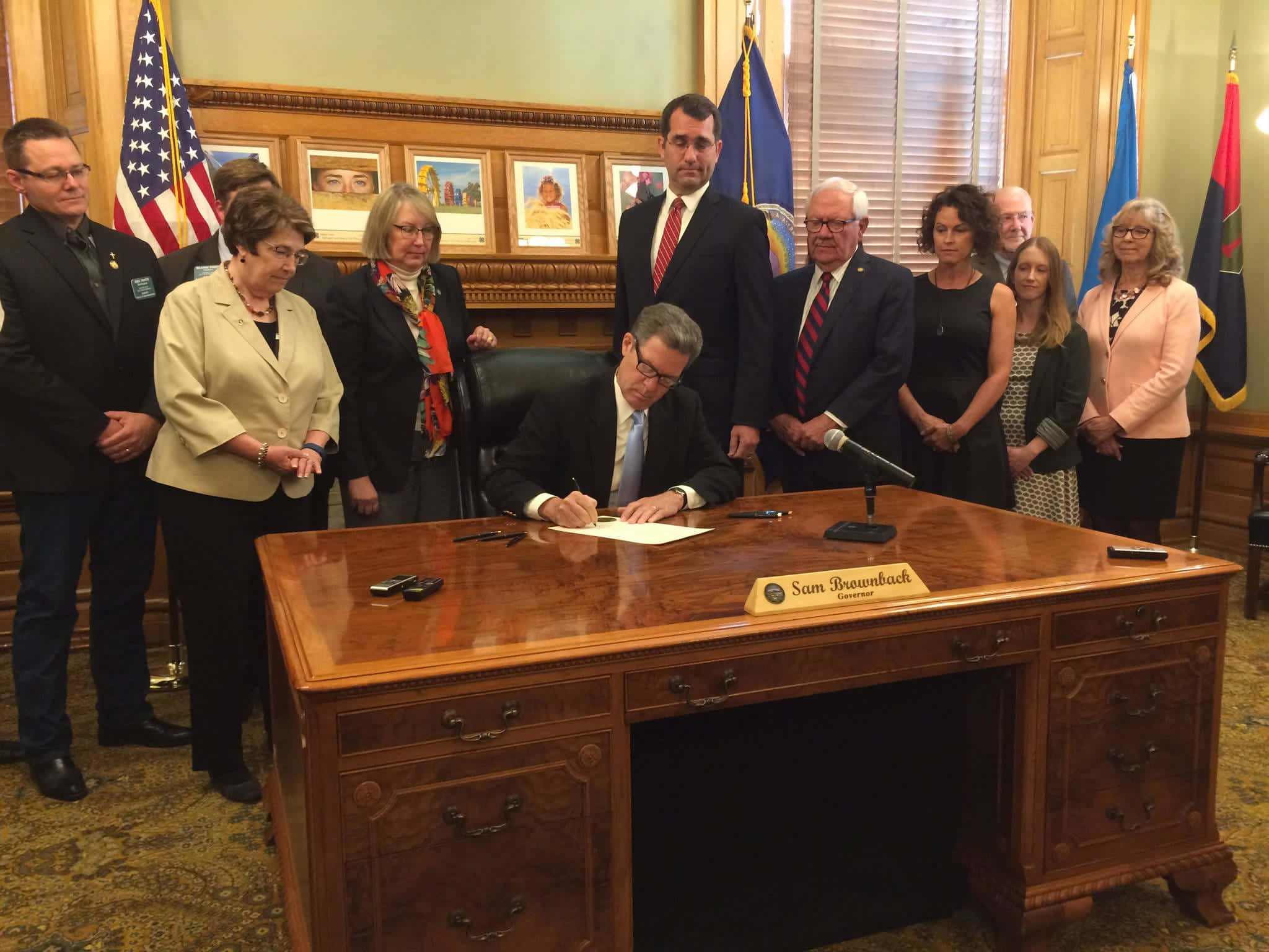 Sam Brownback, suit, large wooden desk, Full HD Desktop Wallpaper