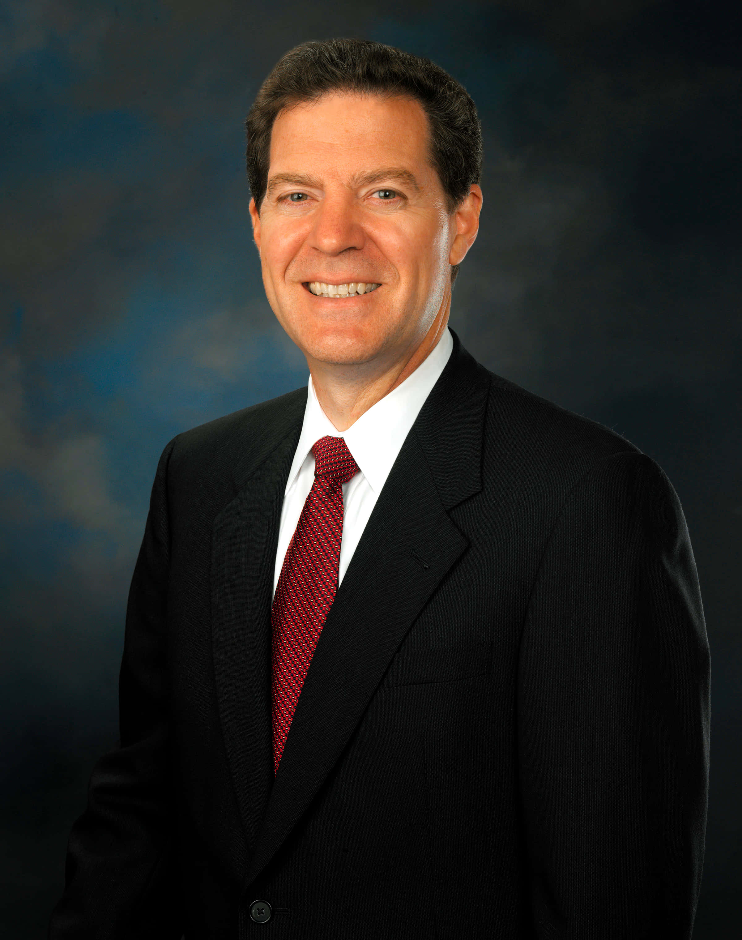 Sam Brownback, black suit, red tie, 2K Phone Wallpaper
