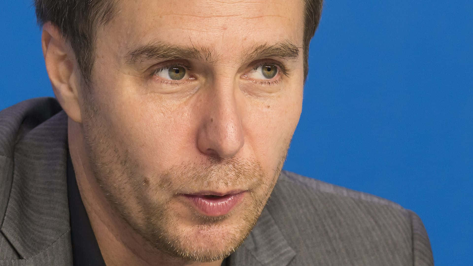 Sam Rockwell, gray suit, solid blue background, Full HD Desktop Wallpaper