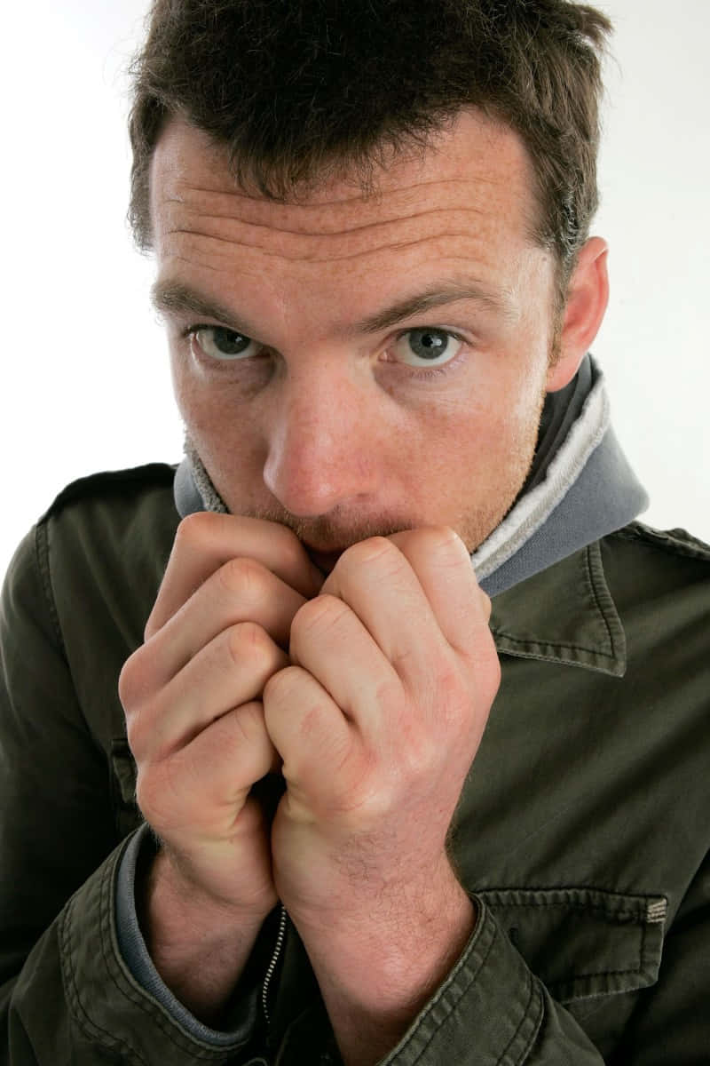 Sam Worthington, intense blue eyes, clenched fists, SD Phone Wallpaper