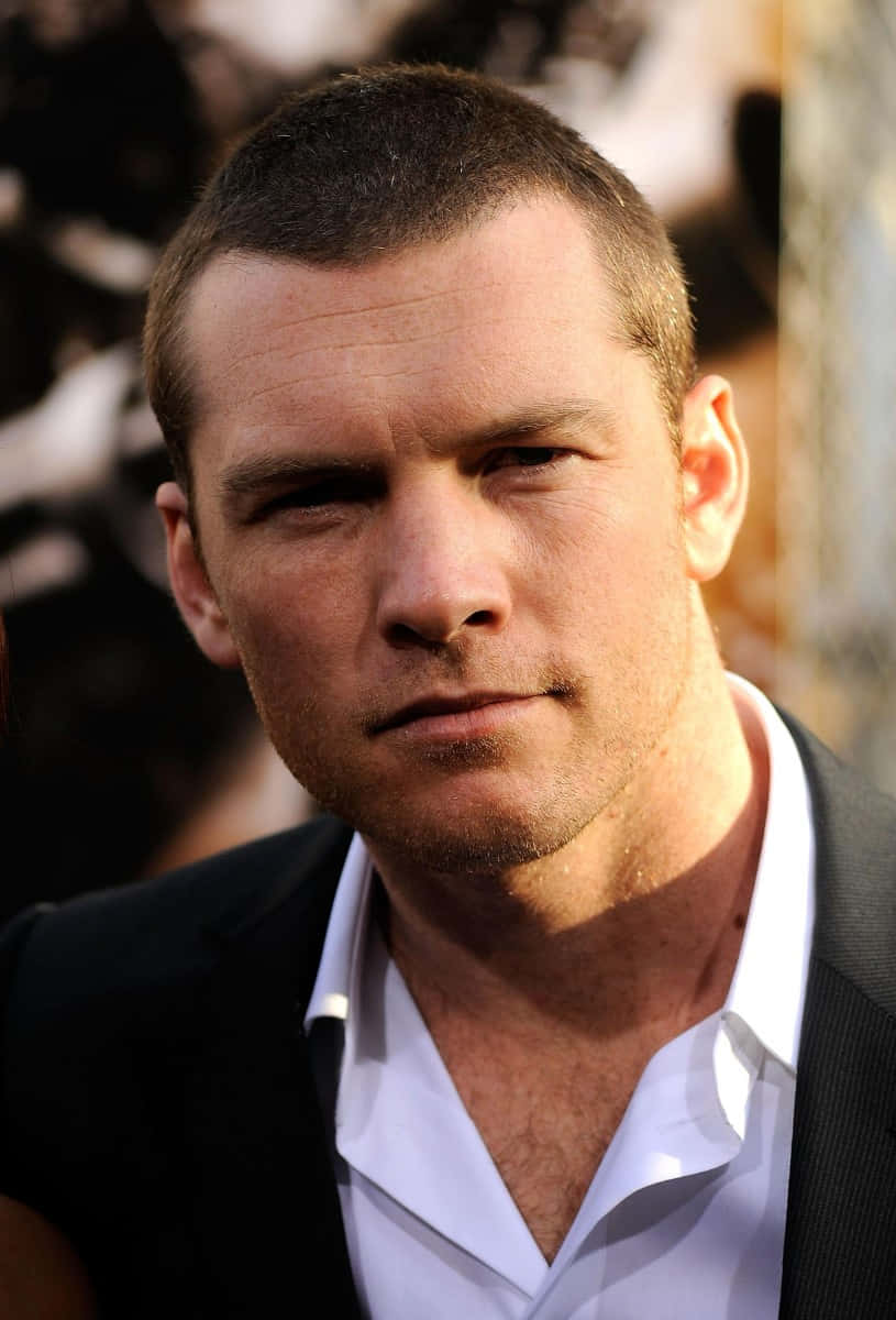 Sam Worthington, short dark hair, black suit, SD Phone Wallpaper