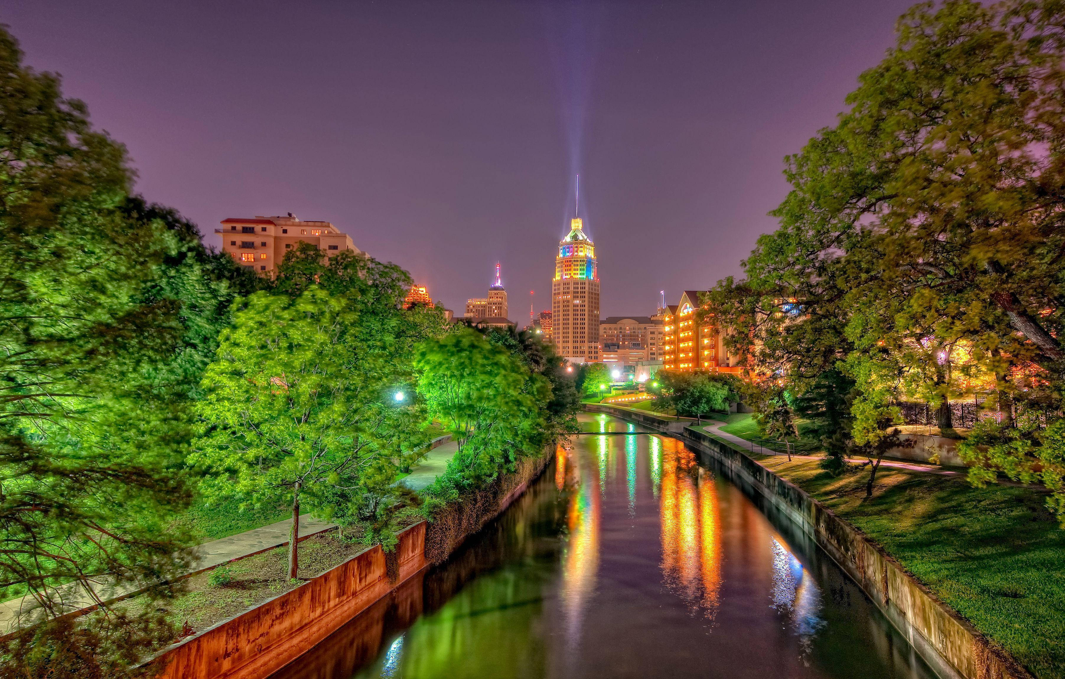 San Antonio River Walk, night cityscape, glowing skyscraper, 2K Desktop Wallpaper