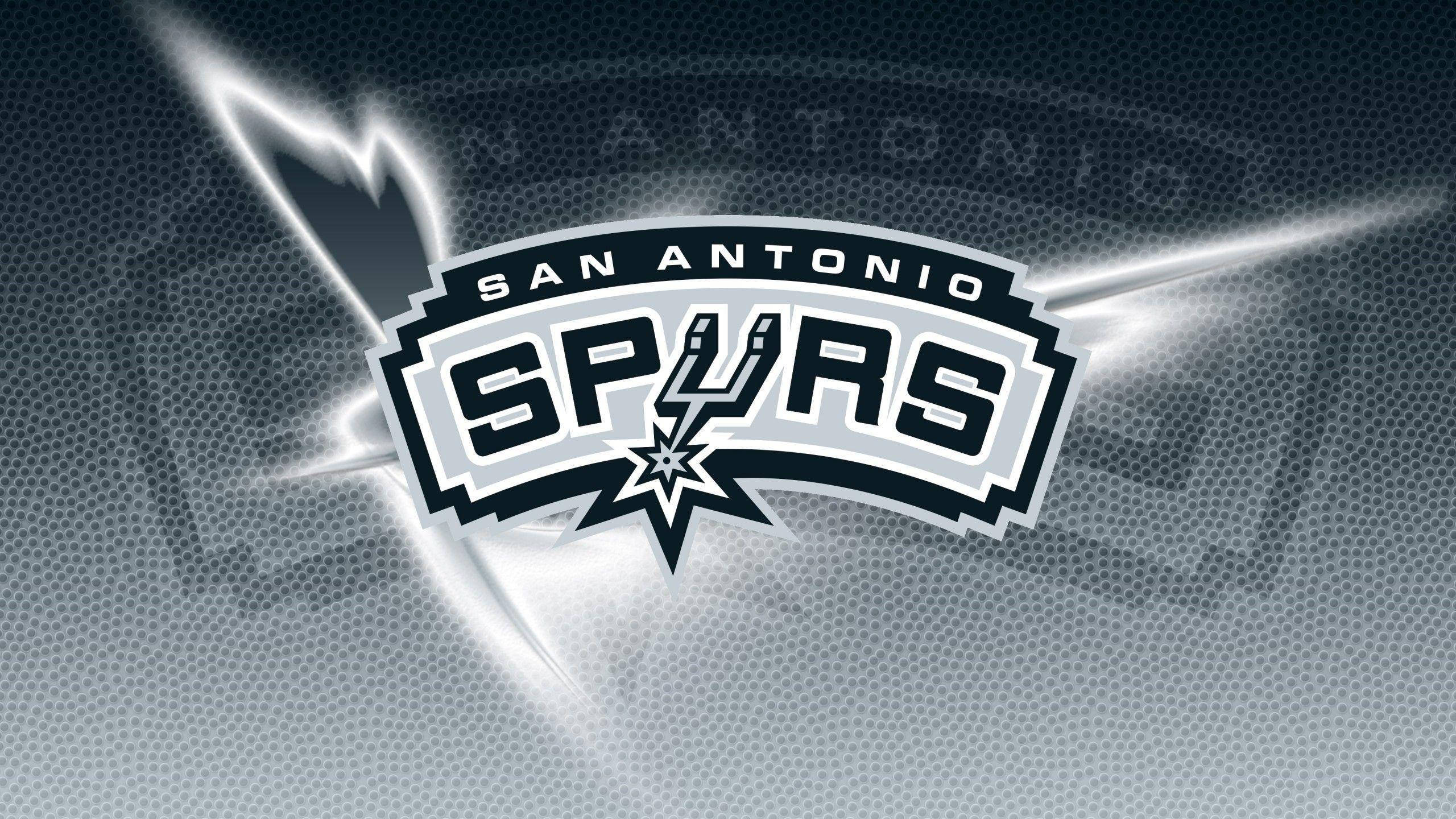 San Antonio Spurs logo, silver light streaks, textured dark blue basketball background, 2K Desktop Wallpaper