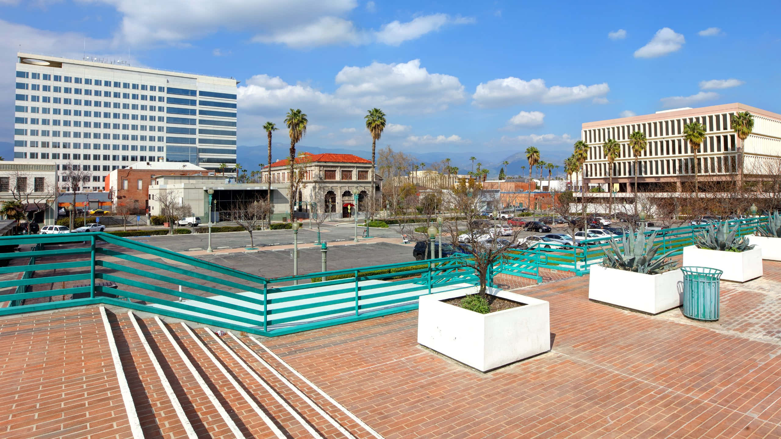 San Bernardino, teal railings, brick walkways, 2K Desktop Wallpaper