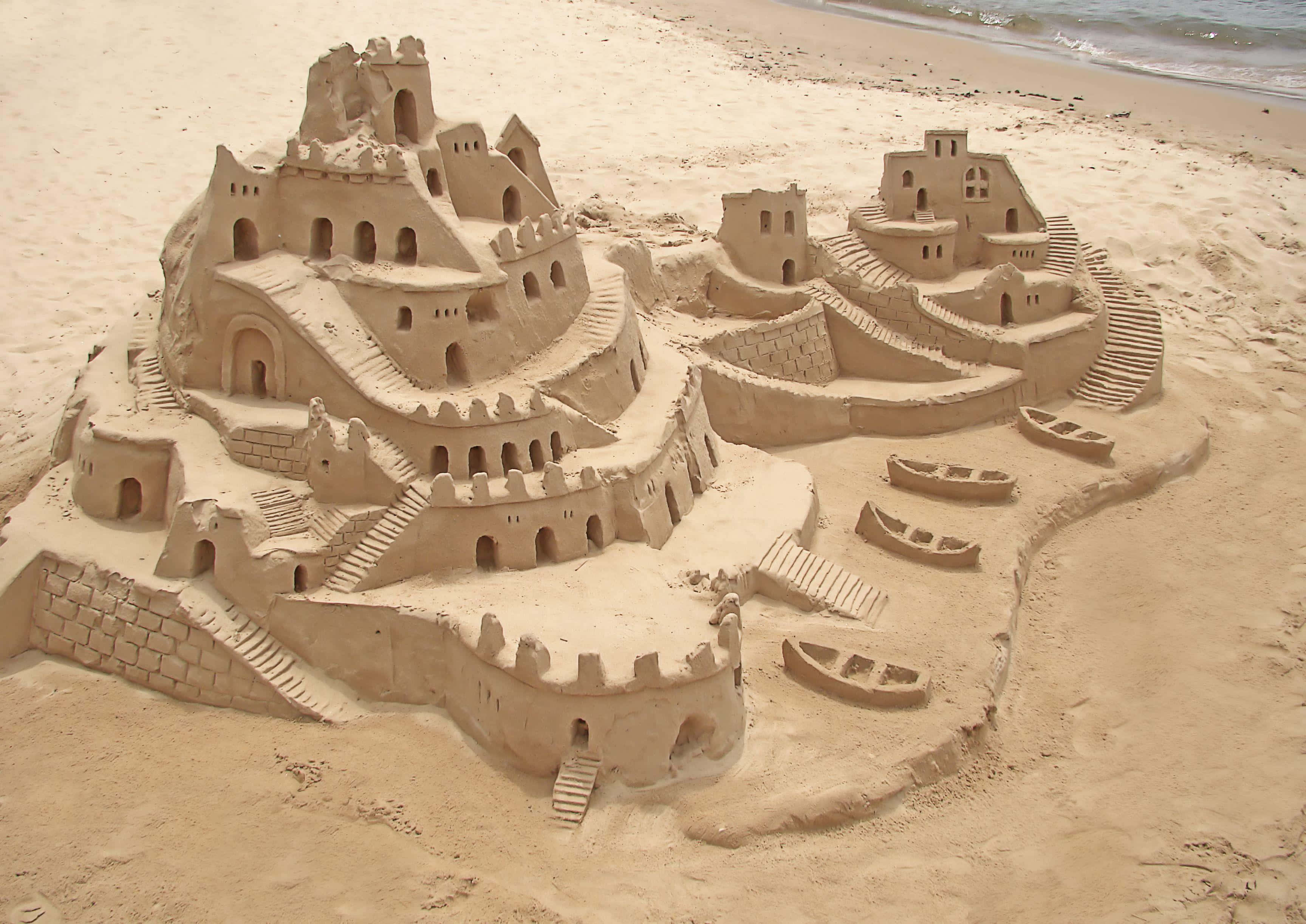 Sandcastles, sunny beach, ocean waves, 2K Desktop Wallpaper