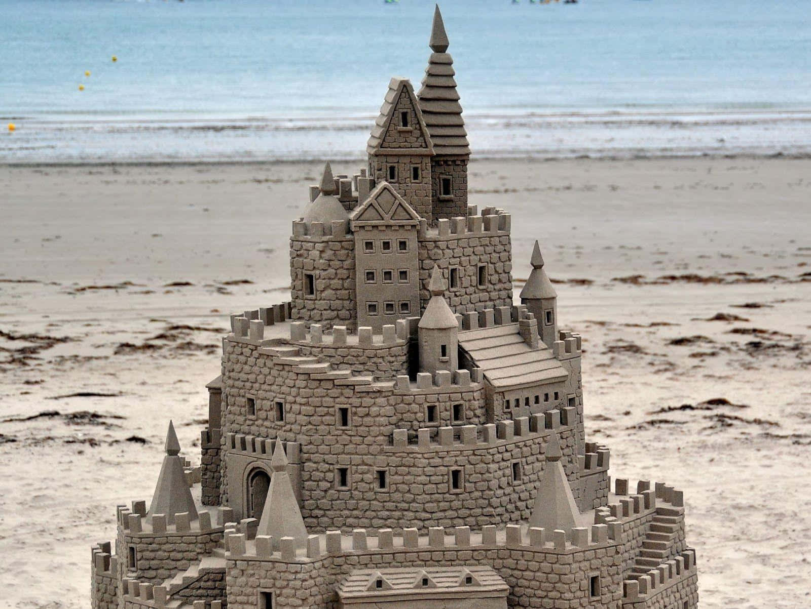 Sandcastles, wet beach, ocean waves, HD Desktop Wallpaper