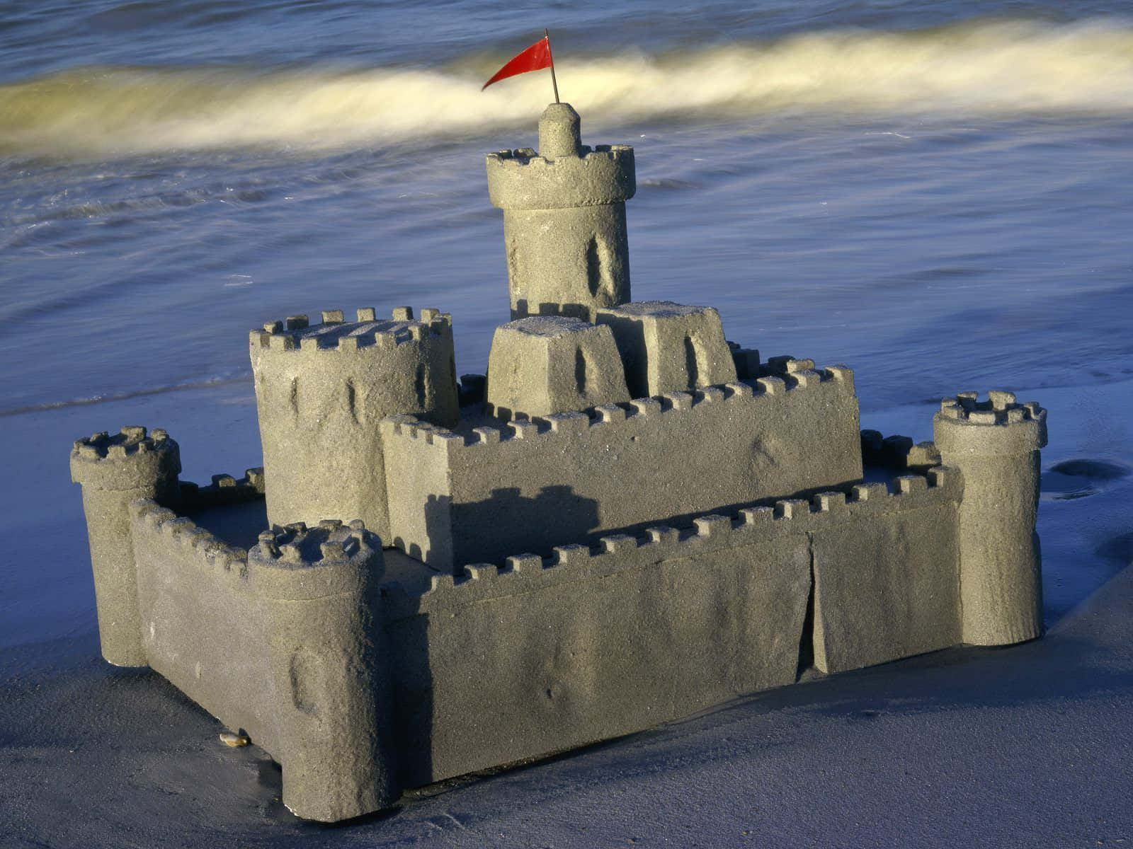 Sandcastles, red flag, wet beach, HD Desktop Wallpaper