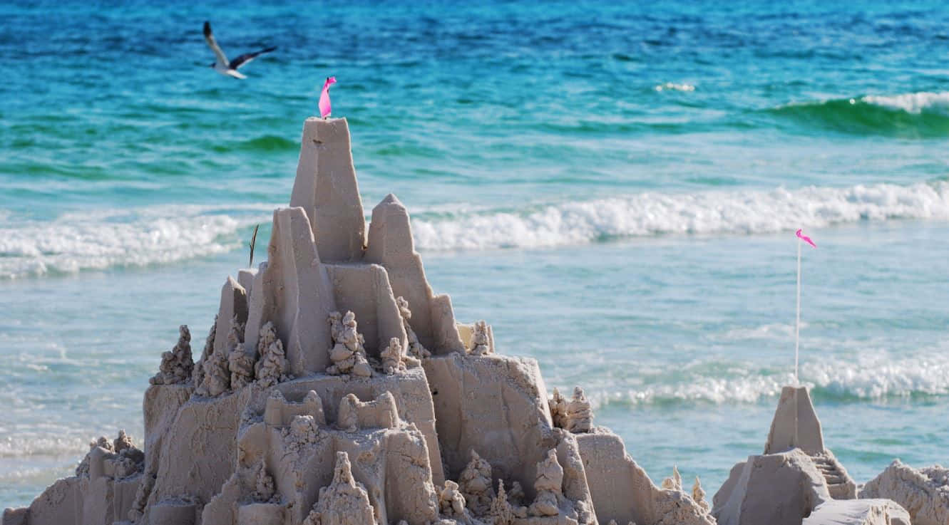 Sandcastles, pink flags, turquoise waves, HD Desktop Wallpaper