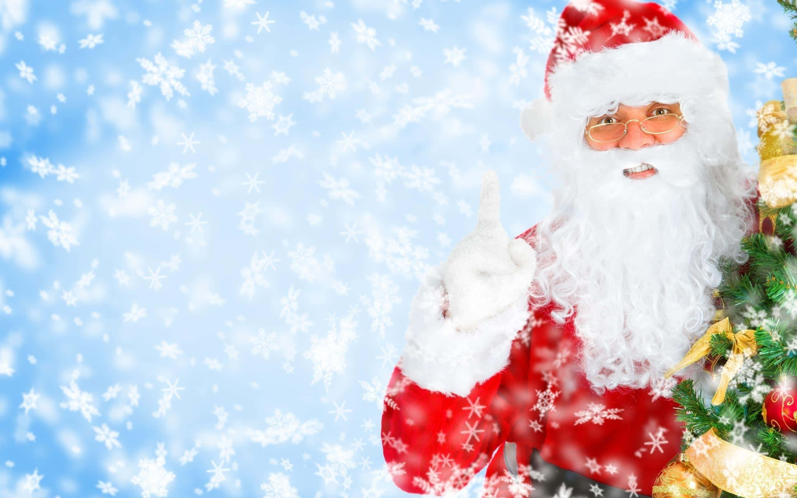 Santa Claus, red suit, snowy blue sky, 2K Desktop Wallpaper