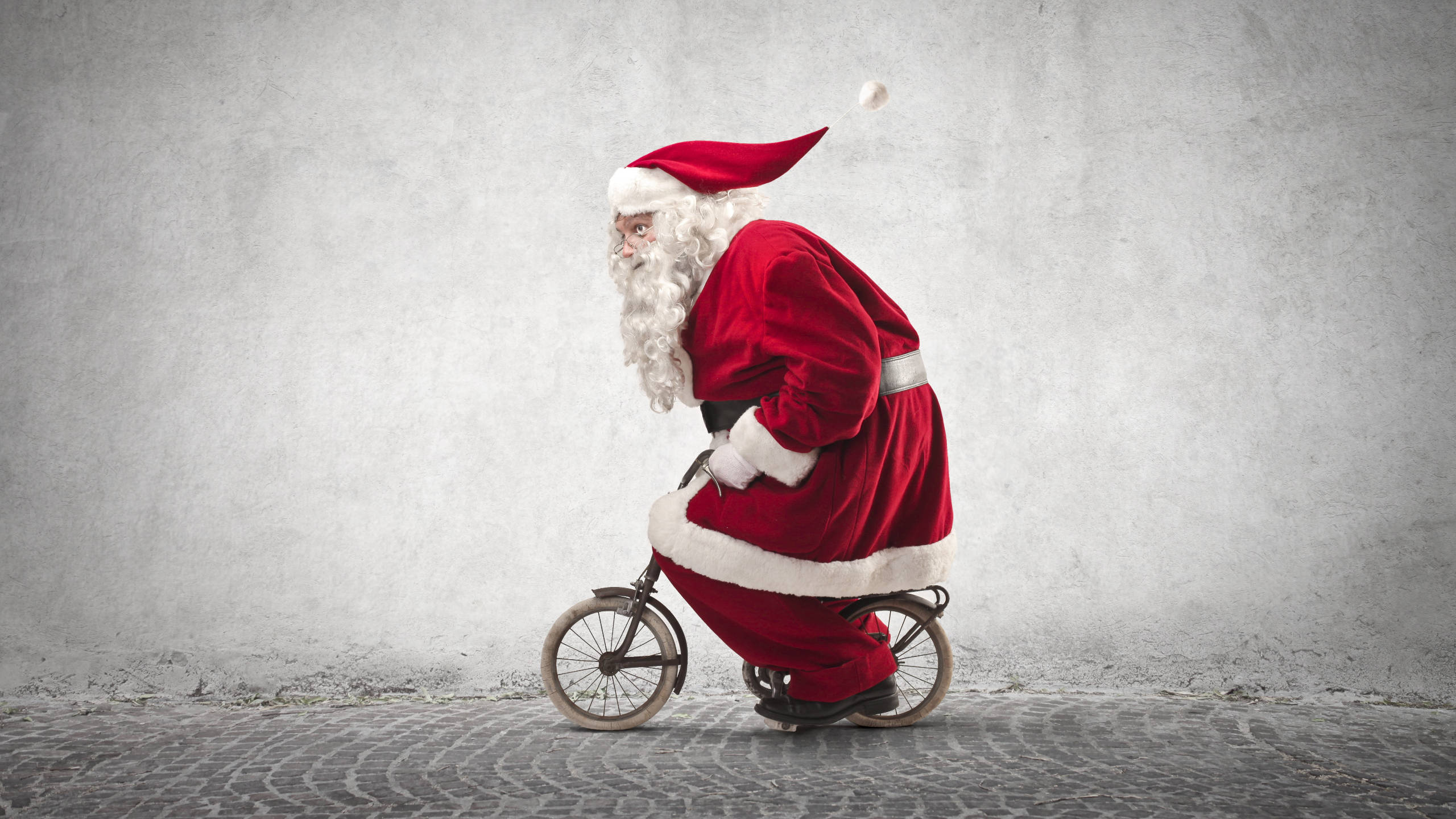 Santa Claus, red suit, small bicycle, 2K Desktop Wallpaper