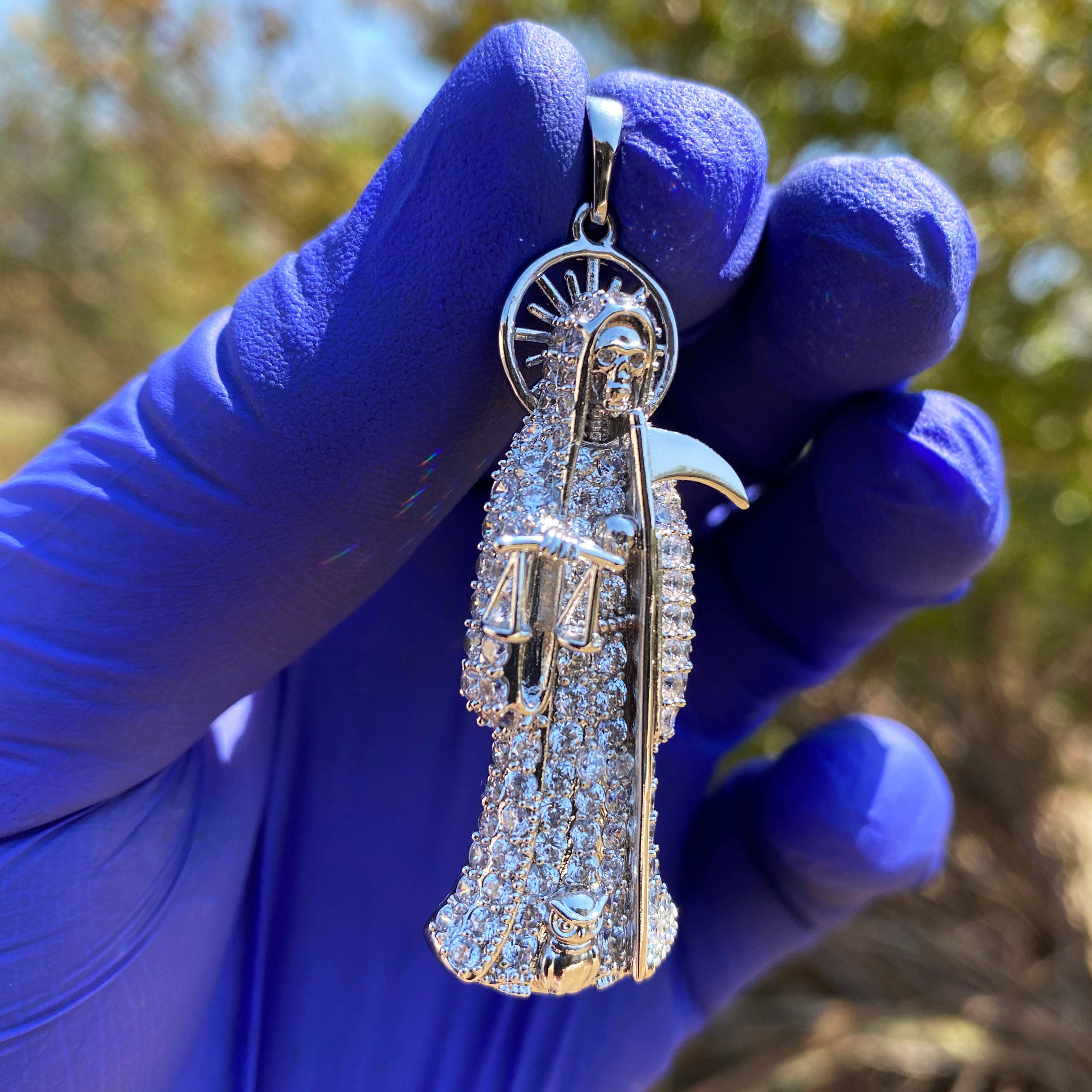 Santa Muerte, silver skeleton pendant, diamonds, 2K Desktop Wallpaper