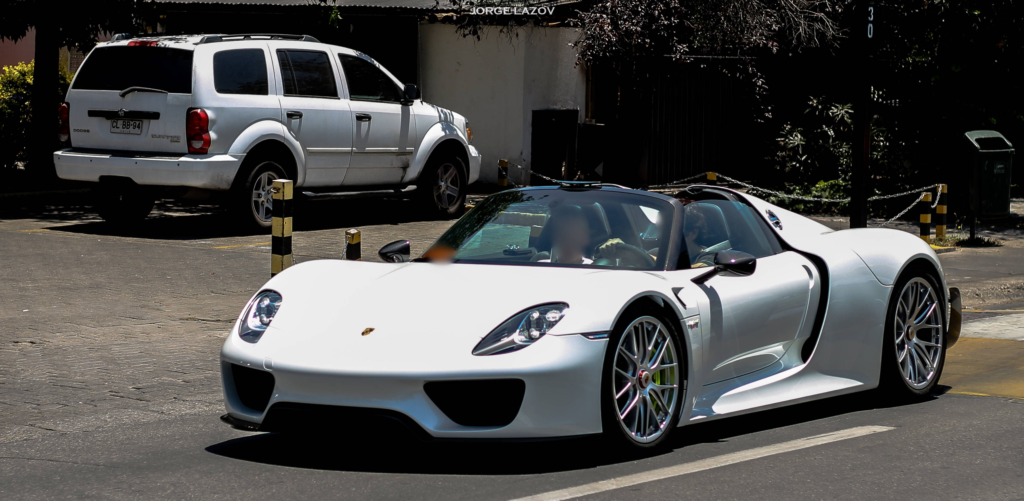 Santiago Chile, white Porsche, sunlit street, 2K Desktop Wallpaper