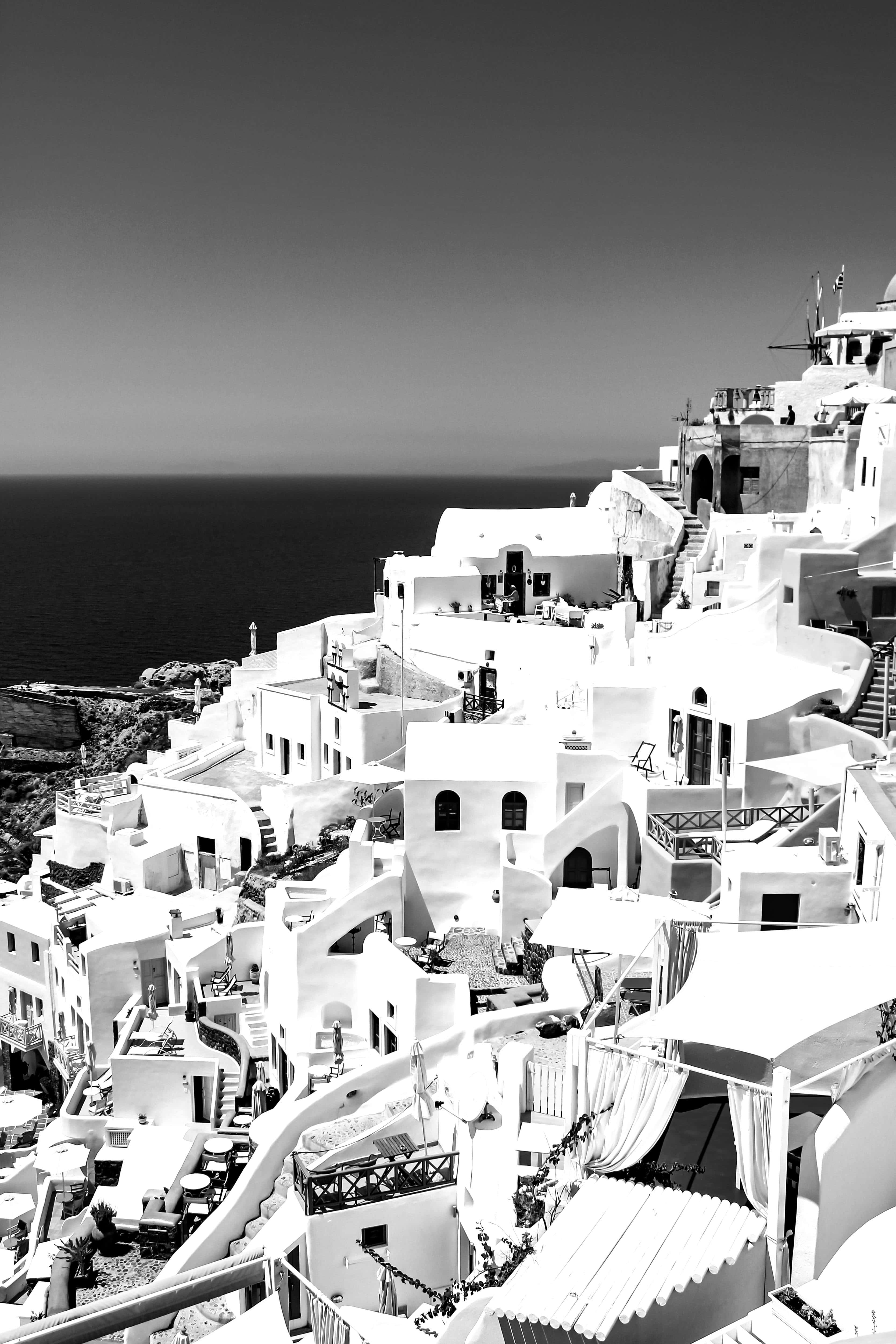 Santorini, black and white architecture, white cliffside buildings, 4K Phone Wallpaper
