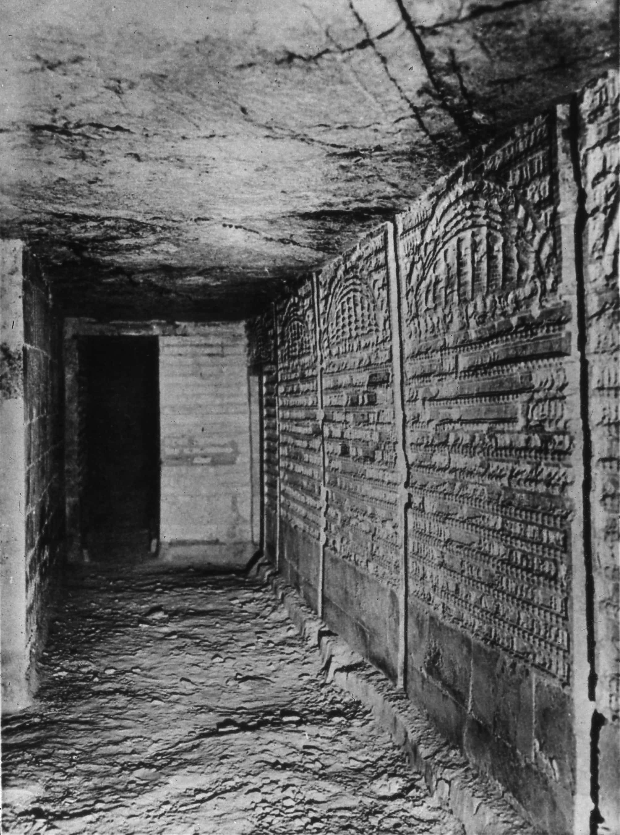 Saqqara Pyramid, narrow stone corridor, ancient carved reliefs, 2K Phone Wallpaper