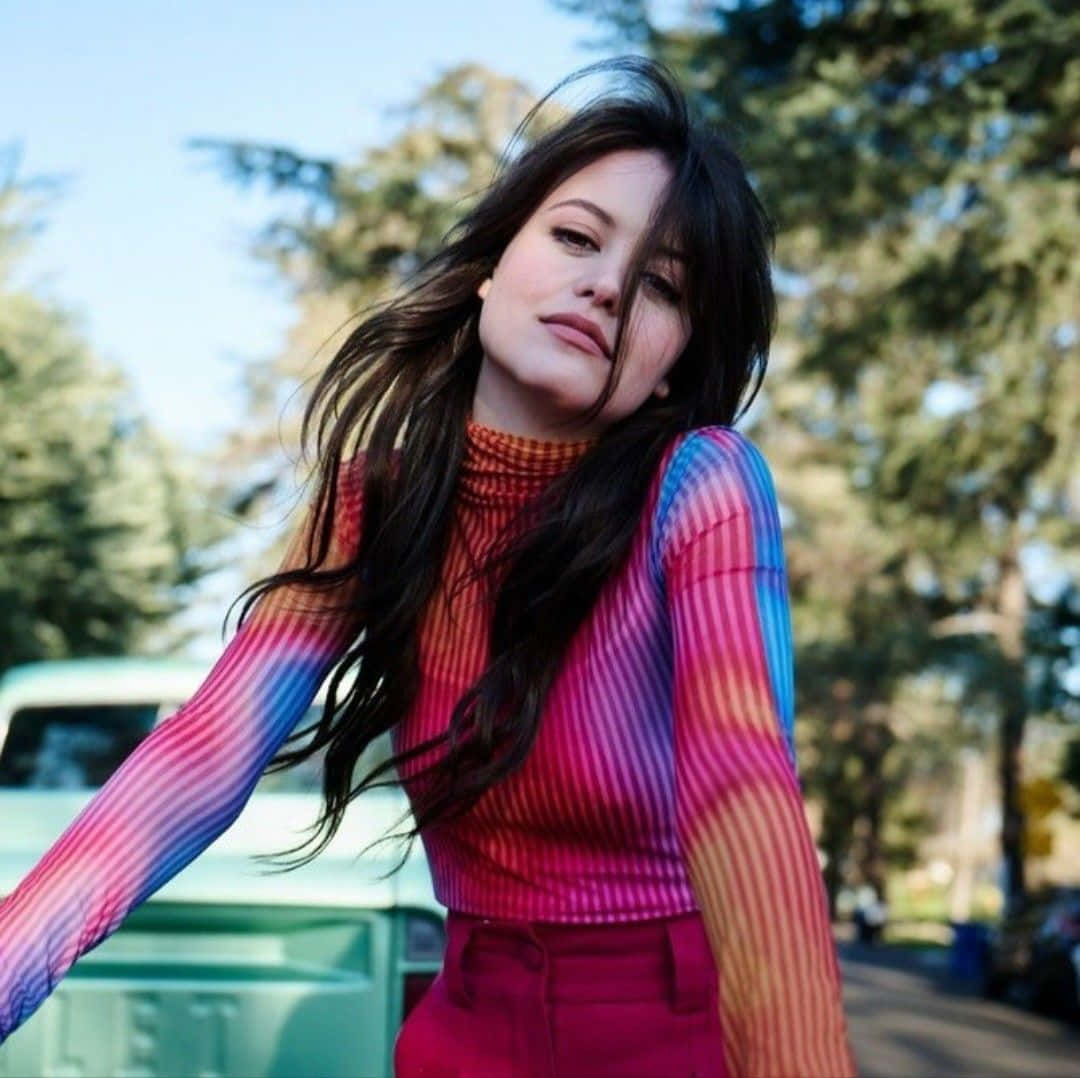 Sara Waisglass, rainbow striped turtleneck, red pants, SD Desktop Wallpaper