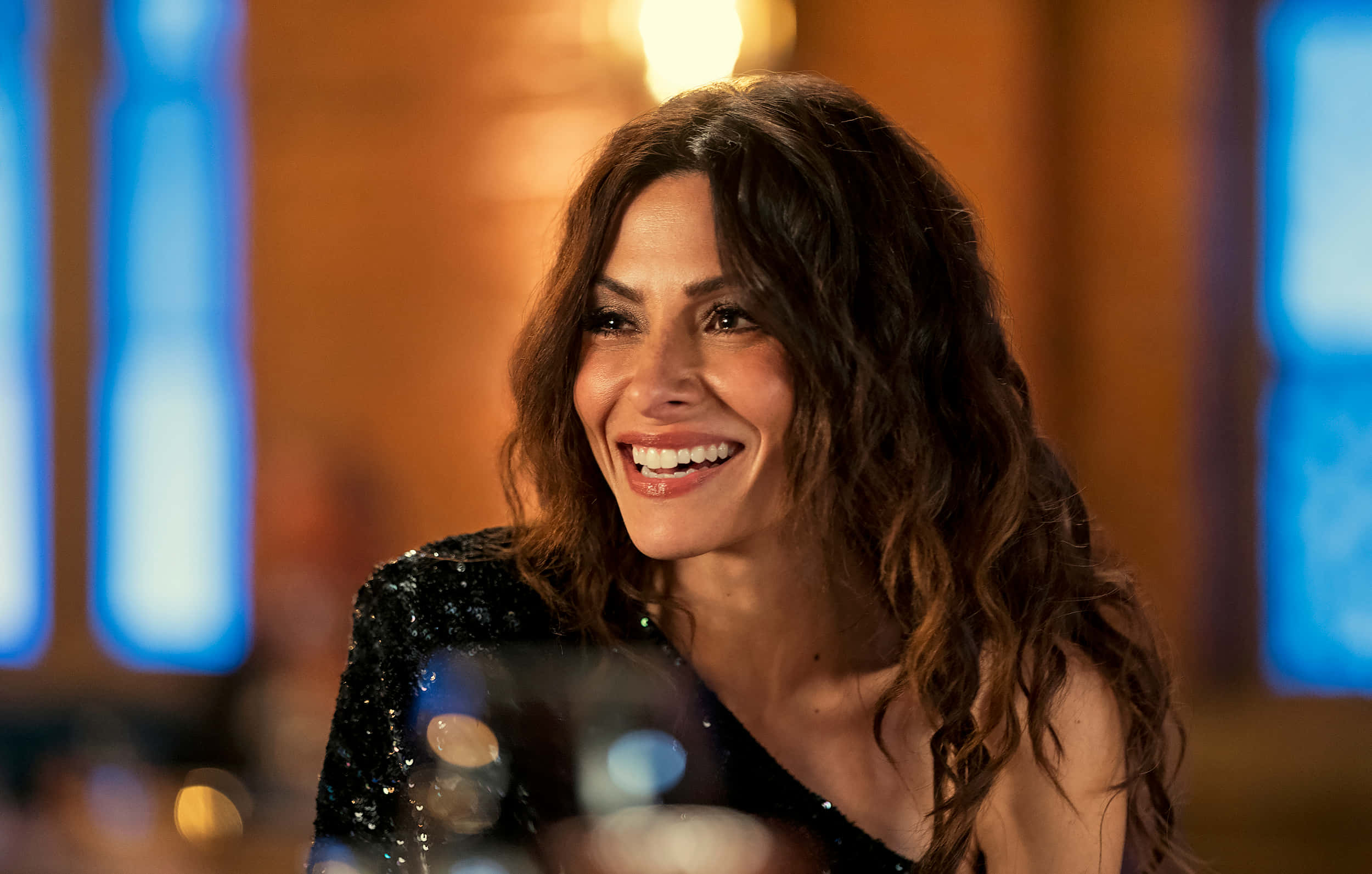 Sarah Shahi, wavy brown hair, dimly lit room, Full HD Desktop Wallpaper