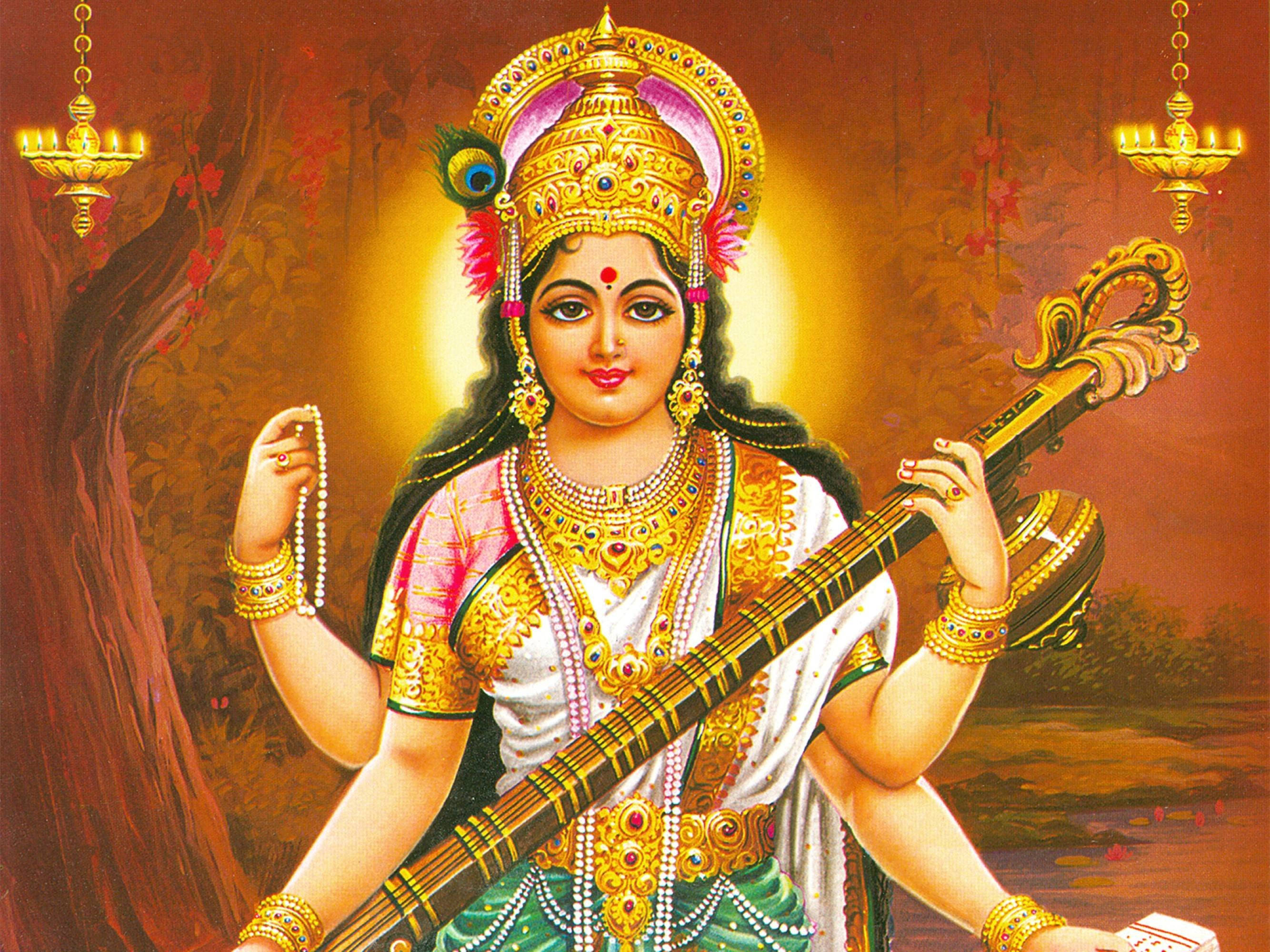 Saraswati Devi, golden jewelry, radiant crown, 2K Desktop Wallpaper