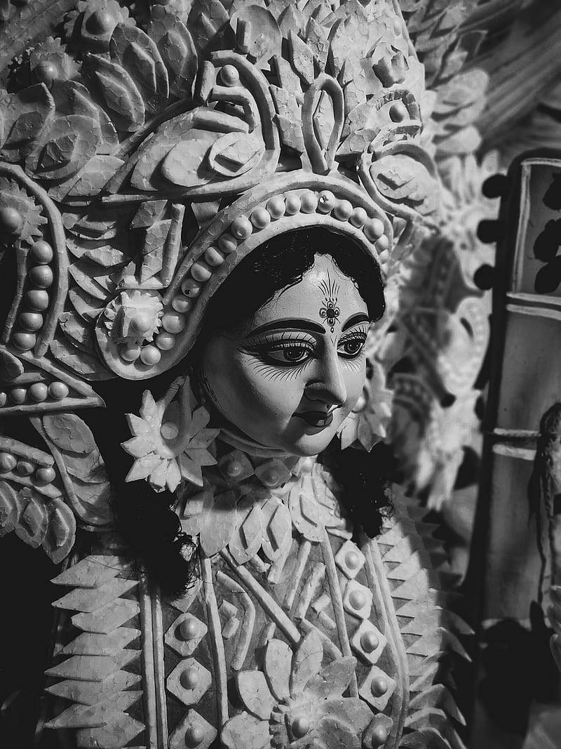 Saraswati, black and white, wooden deity statue, SD Phone Wallpaper