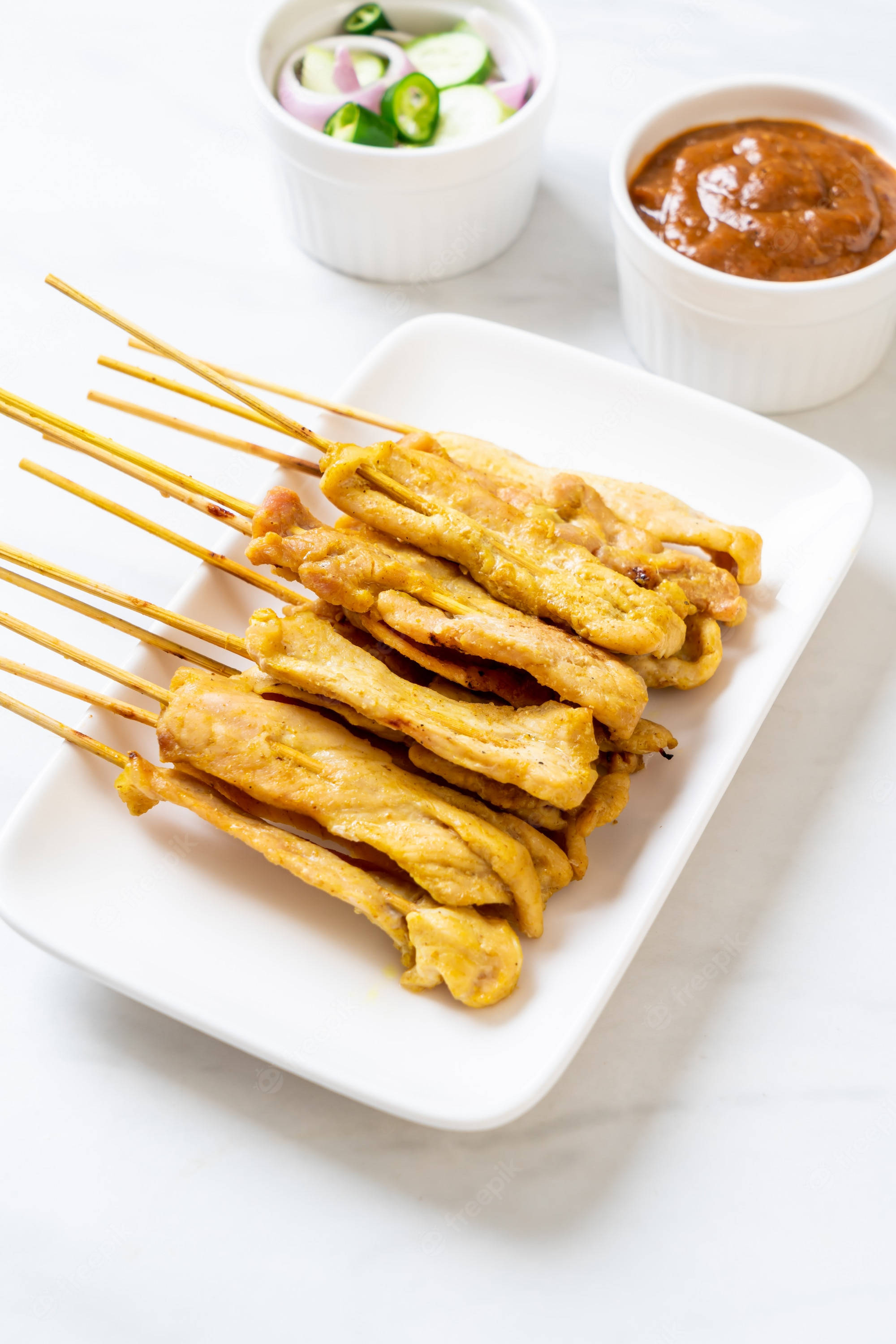 chicken satay, golden-brown grilled satay skewers, white plate, 2K Phone Wallpaper