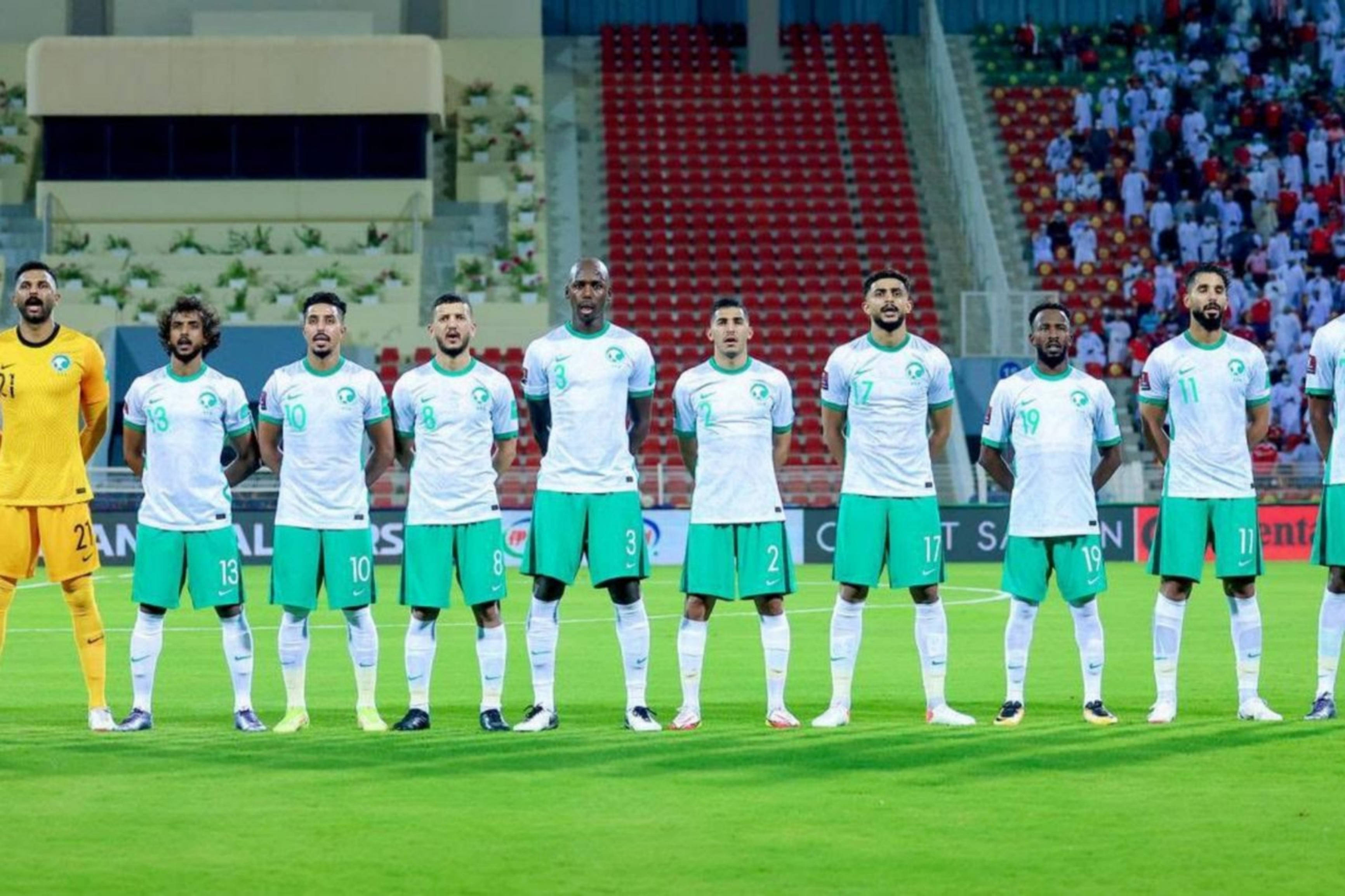 Saudi Arabia National Football Team, vibrant green pitch, stadium lights, 2K Desktop Wallpaper
