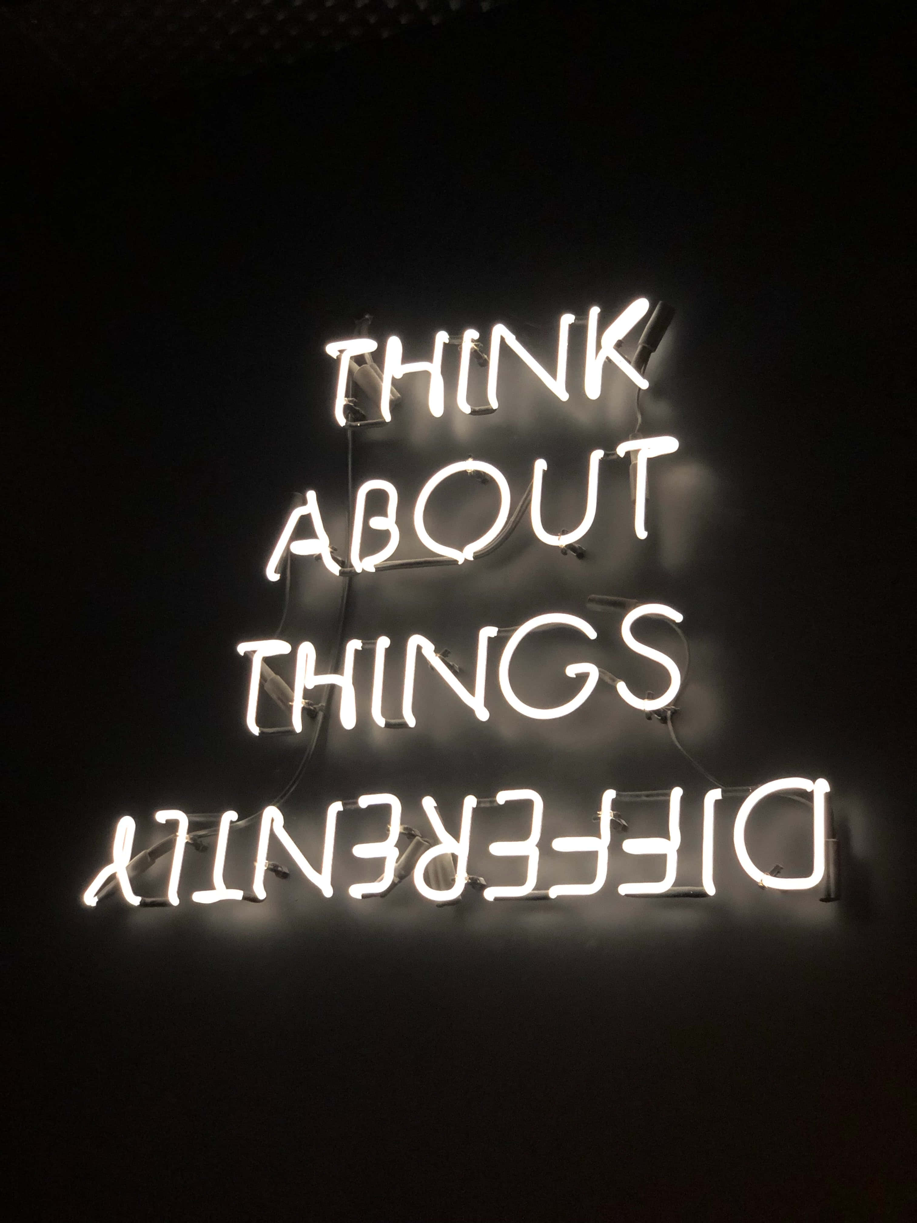 Saying, THINK ABOUT THINGS DIFFERENTLY, glowing white neon sign, 4K Phone Wallpaper