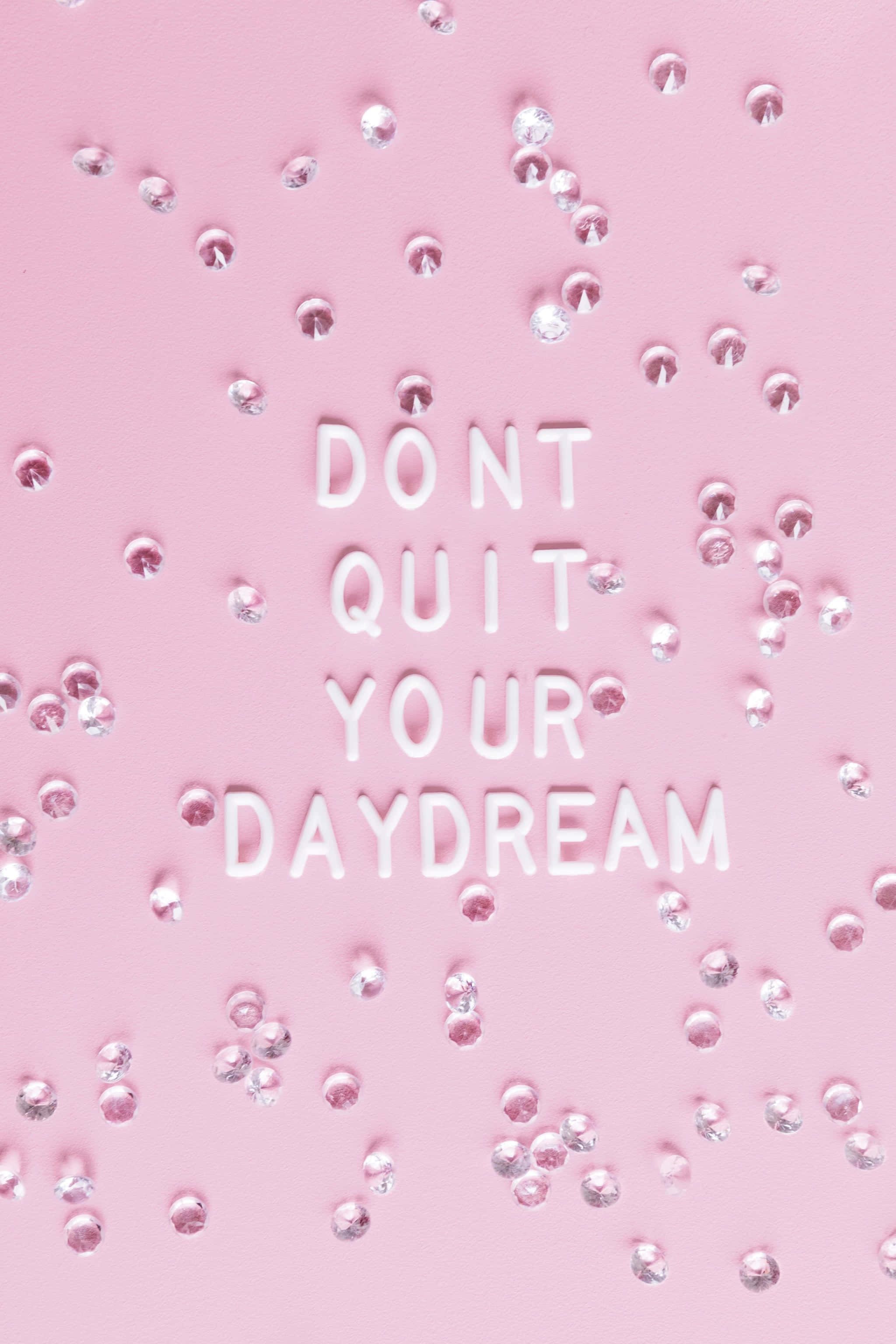 DON'T QUIT YOUR DAYDREAM, white 3d letters, soft pink surface, 2K Phone Wallpaper