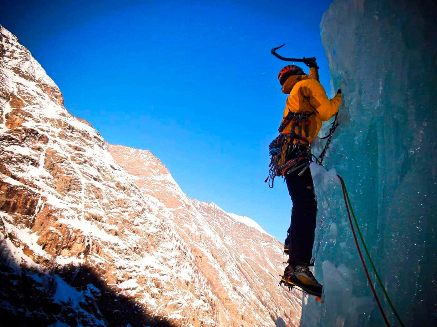 yellow jacket, blue ice wall, clear blue sky, HD Desktop Wallpaper