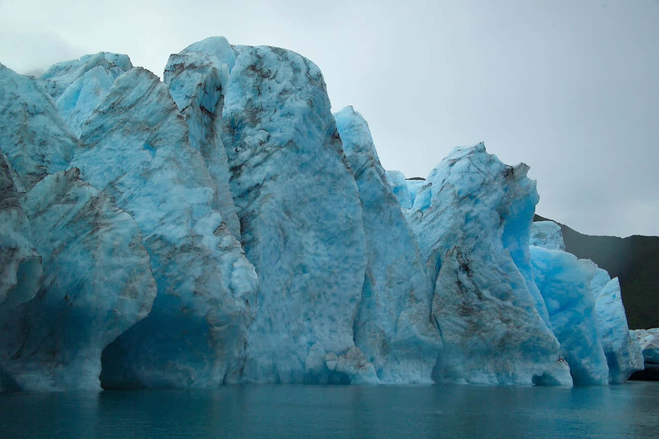 majestic glacial ice formation, blue icebergs, teal waters, HD Desktop Wallpaper