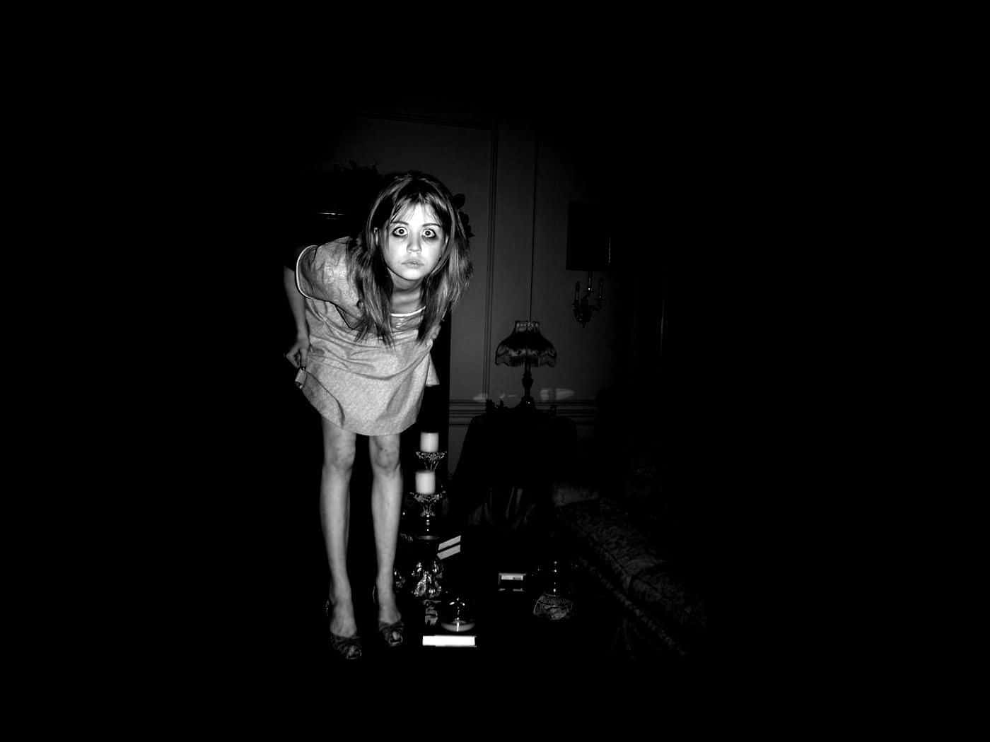 dolllike figure, dimly lit room, wide eyes, HD Desktop Wallpaper