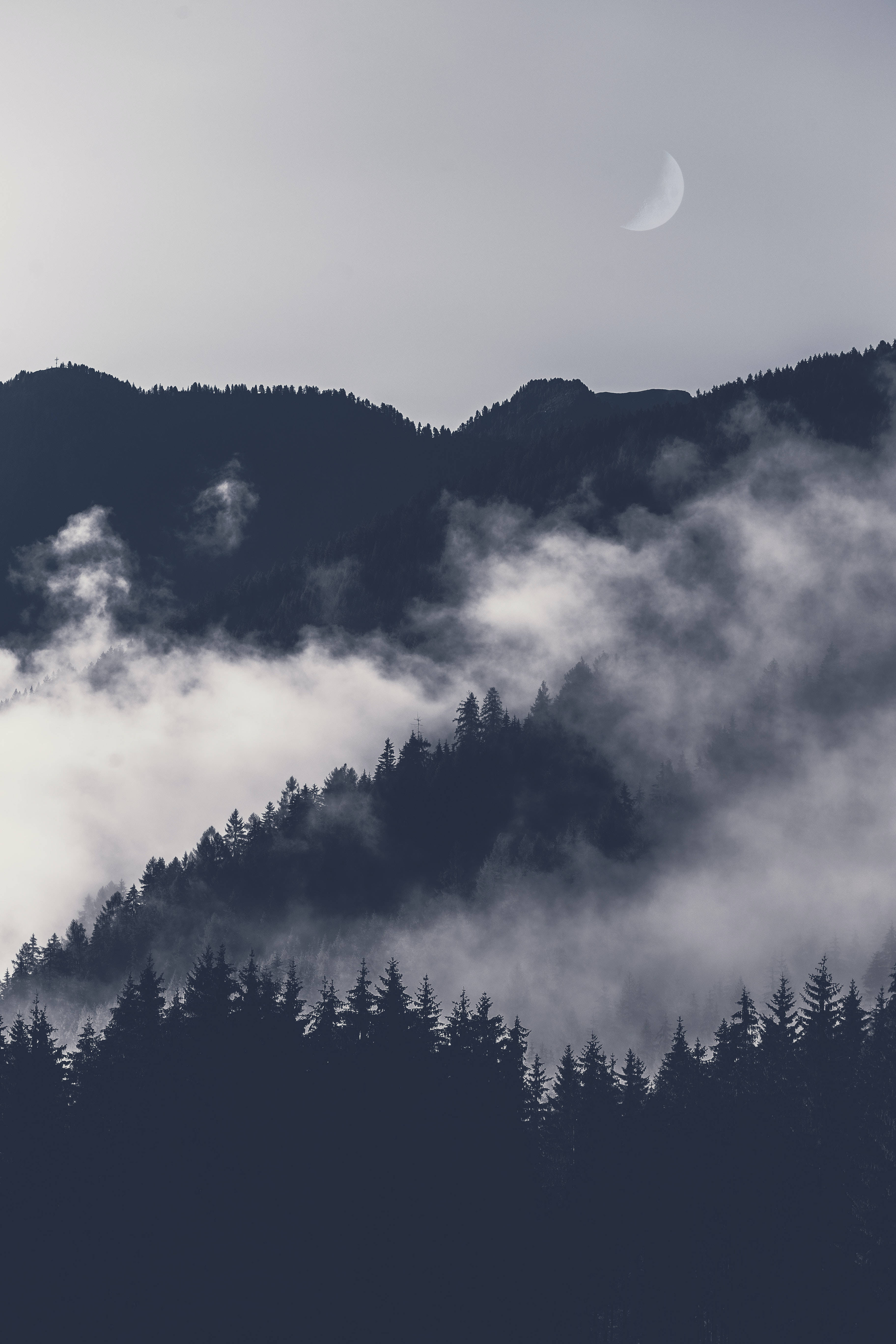 crescent moon, misty forested mountains, gray sky, 5K Phone Wallpaper