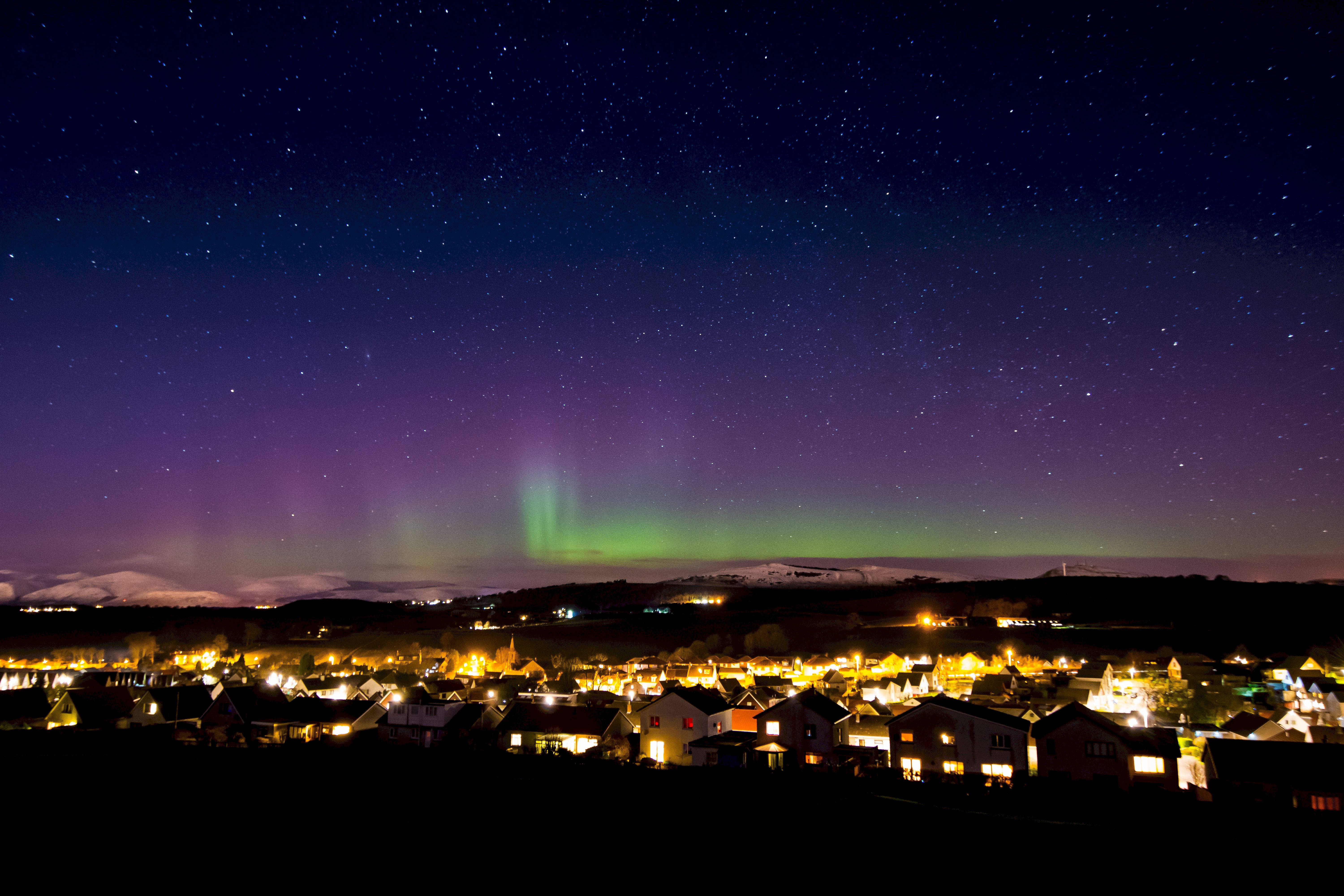 aurora borealis, purple and green, snow-dusted town, 5K Desktop Wallpaper