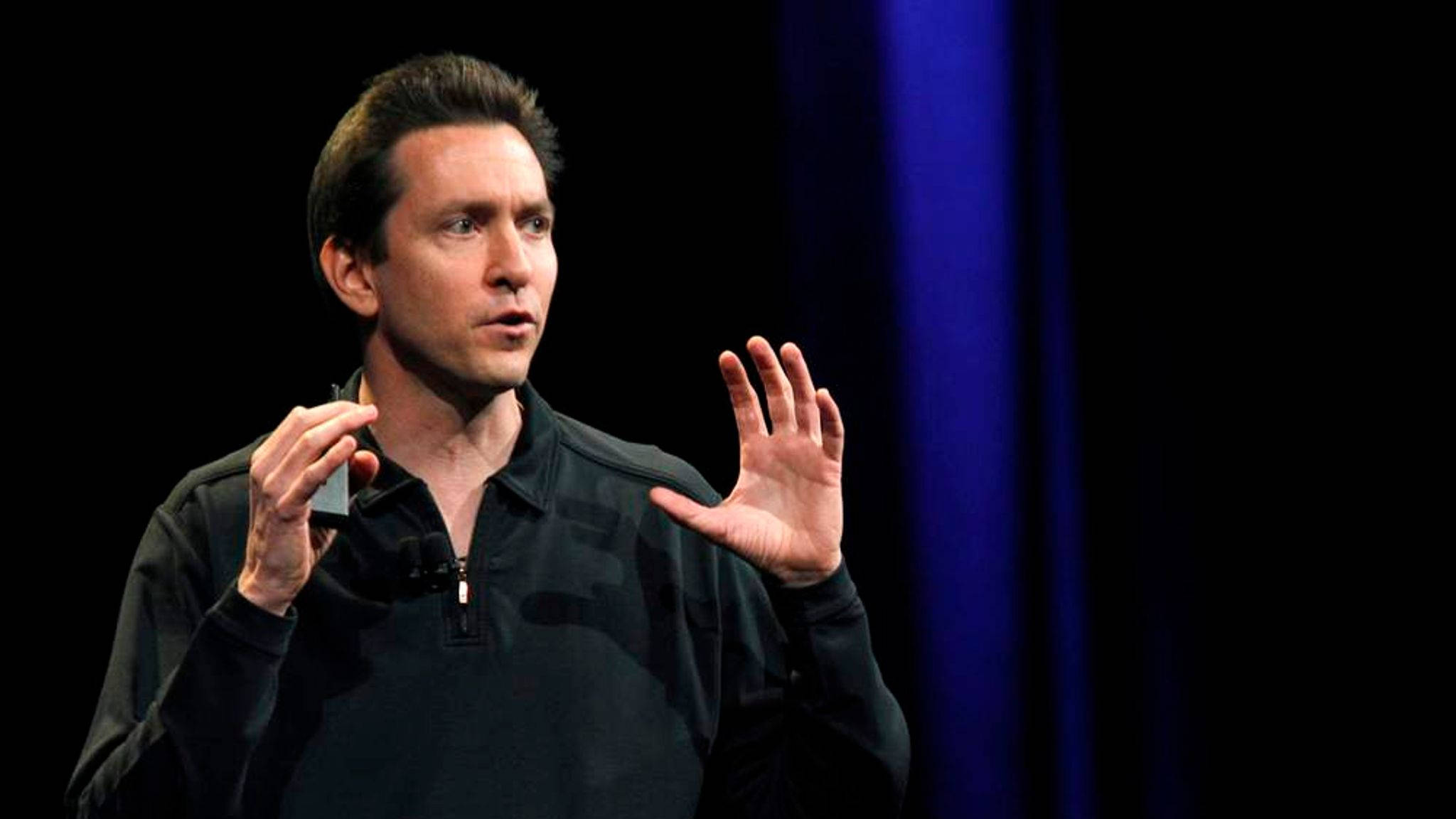 Scott Forstall, black zip-neck shirt, dark blue curtain backdrop, Full HD Desktop Wallpaper