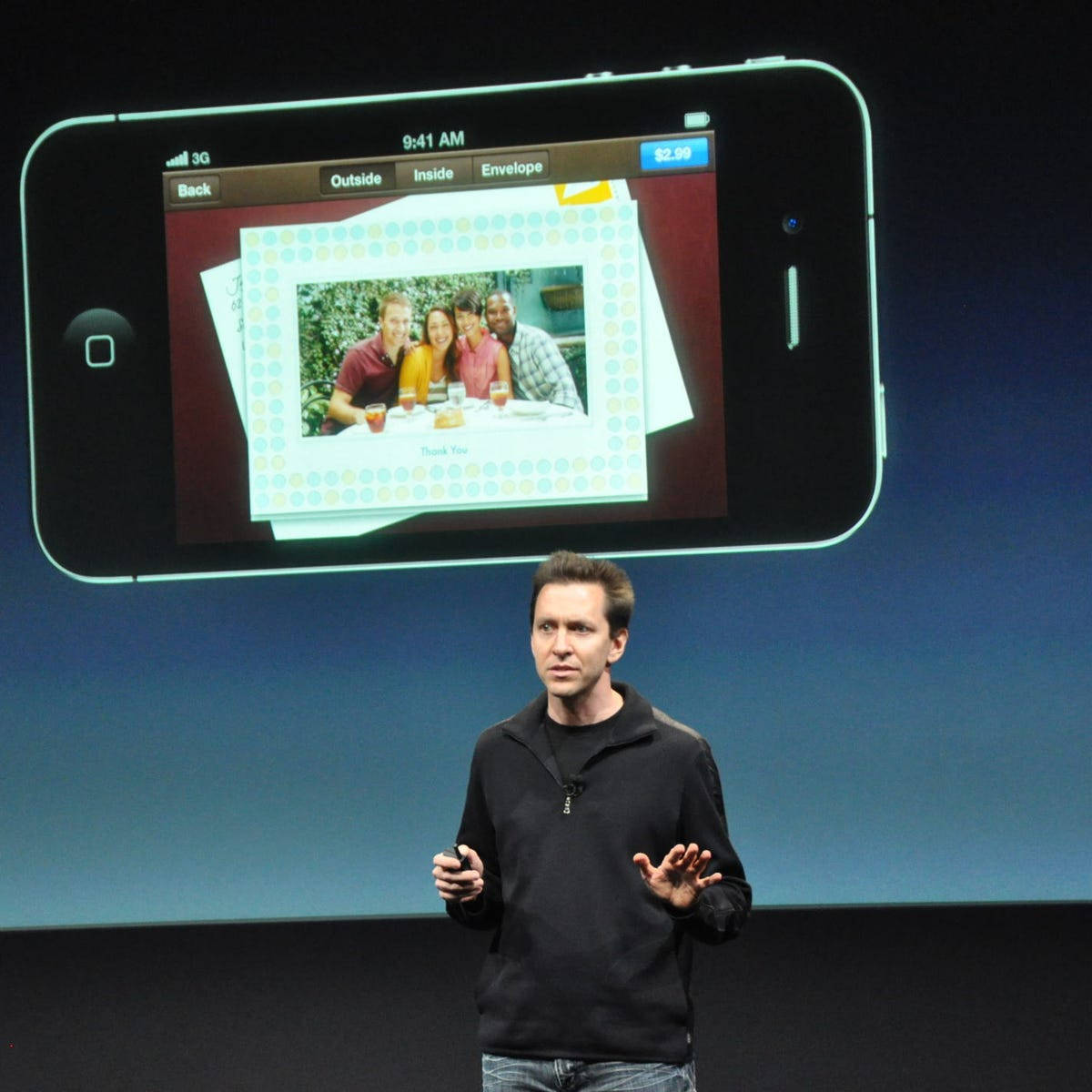 Scott Forstall, iPhone, photo of four people at a table, SD Desktop Wallpaper