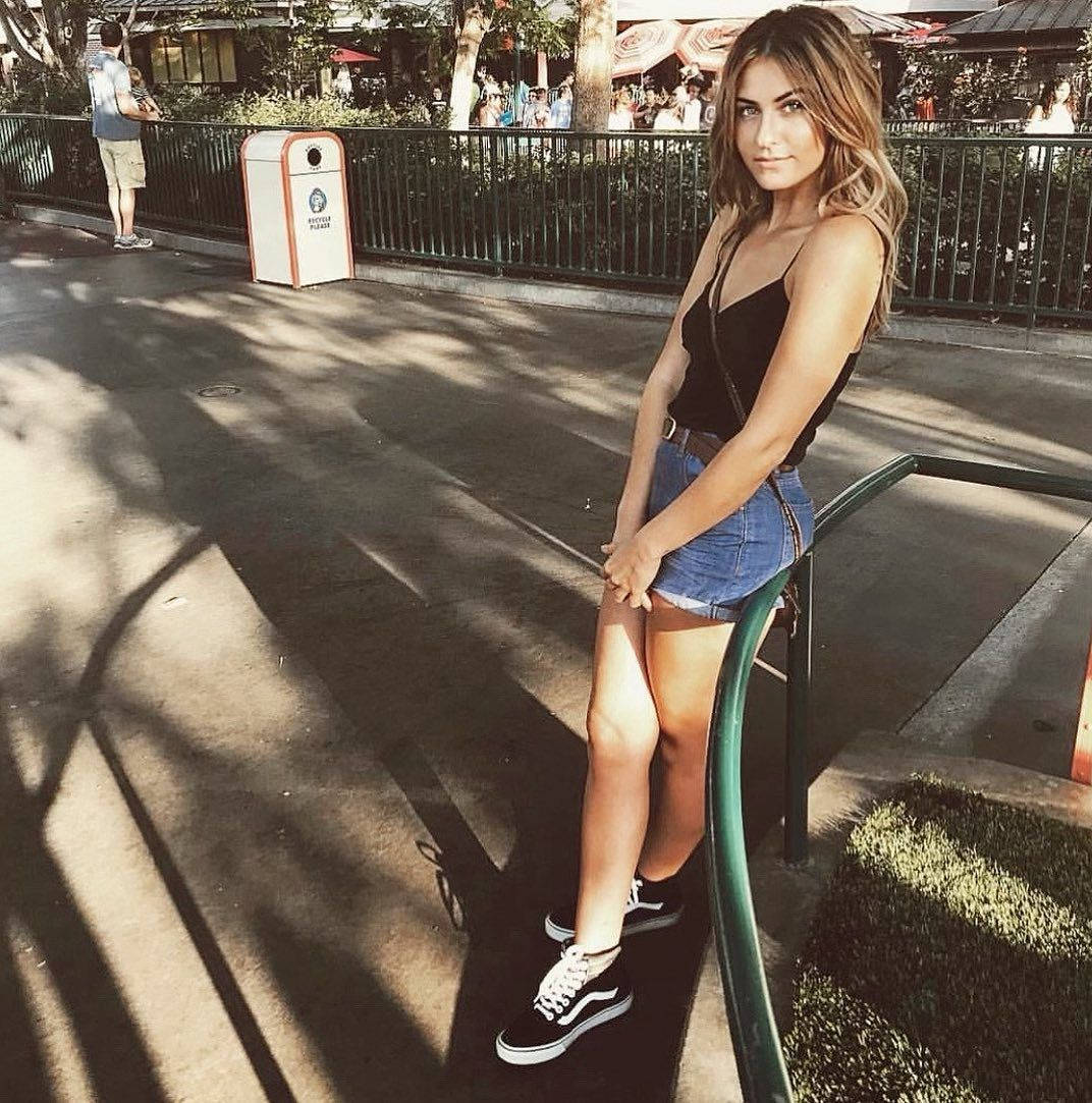 Scout Taylor-Compton, green railing, dappled sunlight, SD Phone Wallpaper