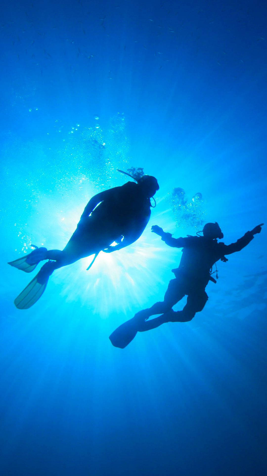 scuba divers, radiant sunbeam, deep blue ocean water, Full HD Phone Wallpaper