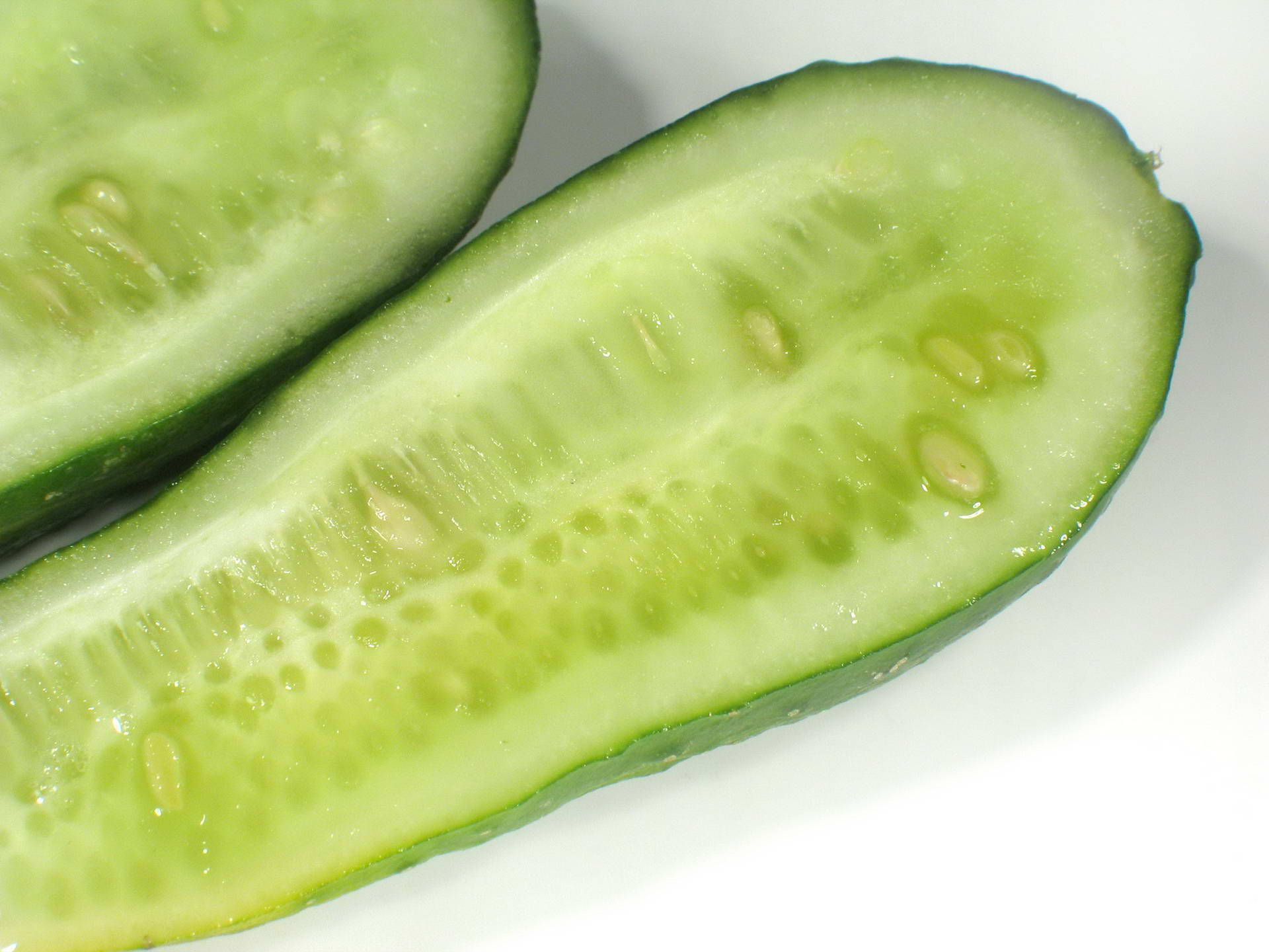 green sliced cucumber, pale green flesh, tiny seeds, Full HD Desktop Wallpaper