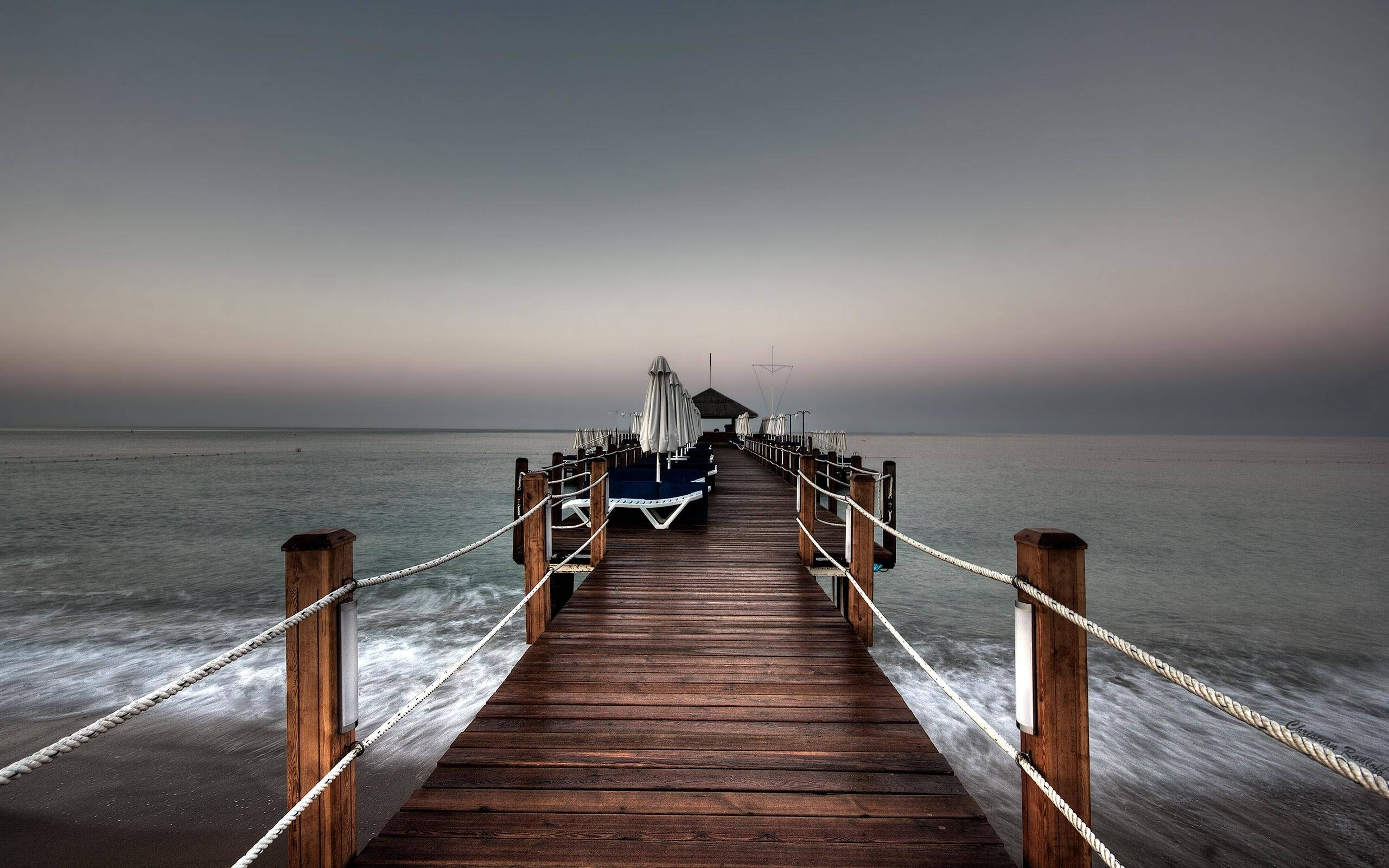 wooden pier, calm ocean waters, twilight, 2K Desktop Wallpaper