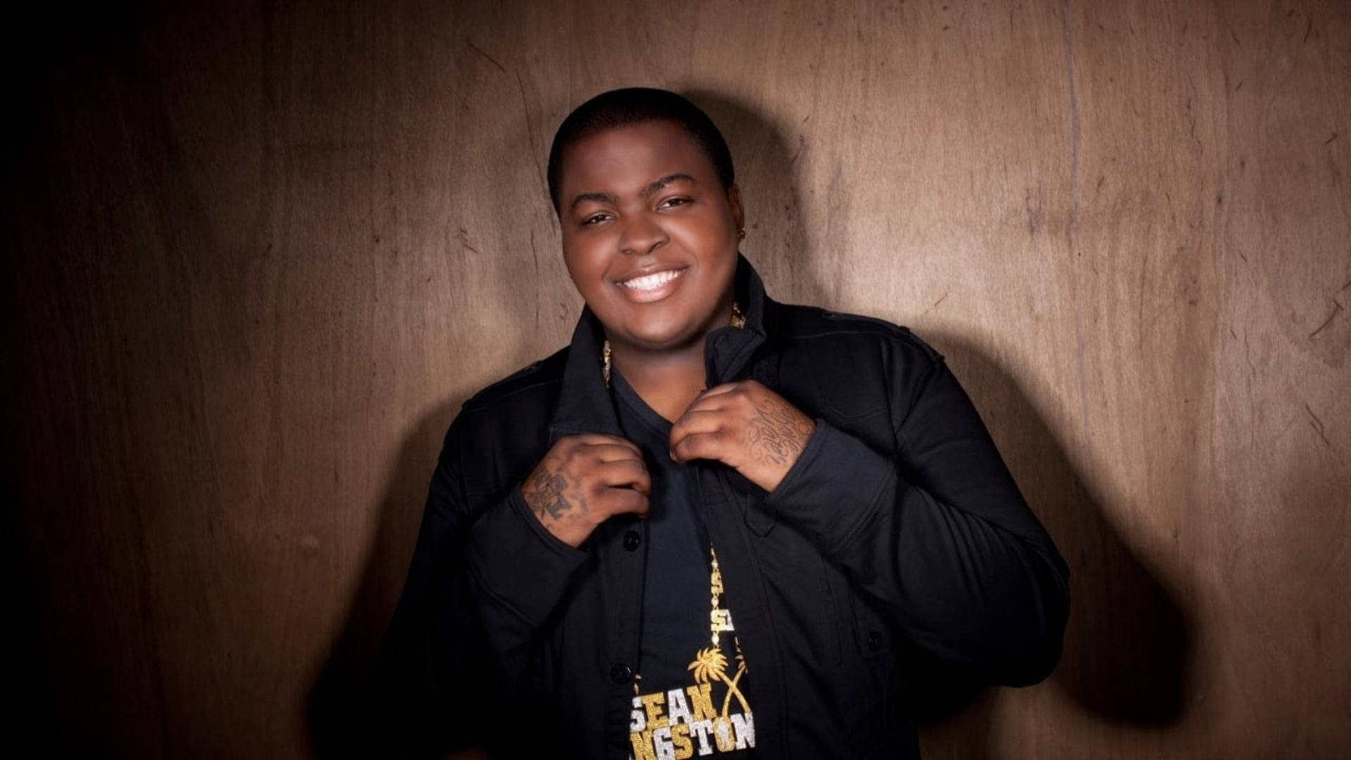 Sean Kingston, black jacket, warm wooden wall, Full HD Desktop Wallpaper