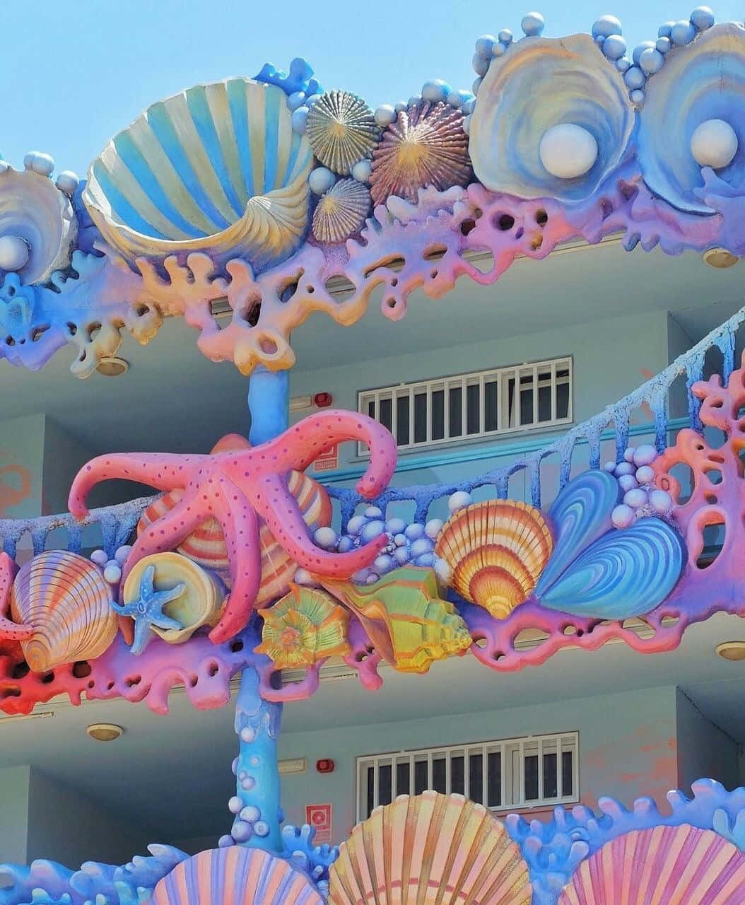 Colorful Seashelland Octopus Balcony Art, vibrant coral reef sculpture, oversized seashells, HD Phone Wallpaper
