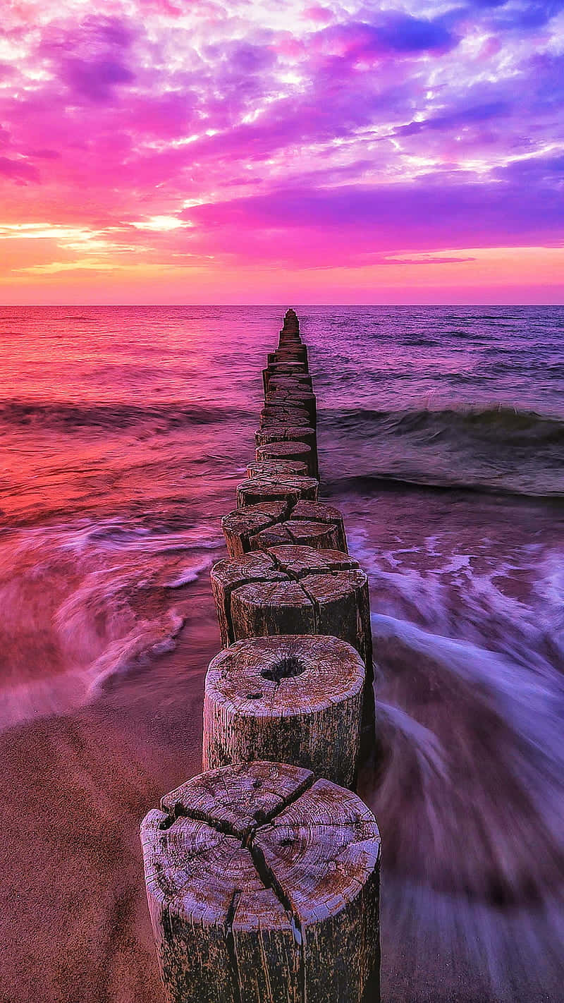 pastel sunset, beach pier, weathered wooden pilings, HD Phone Wallpaper