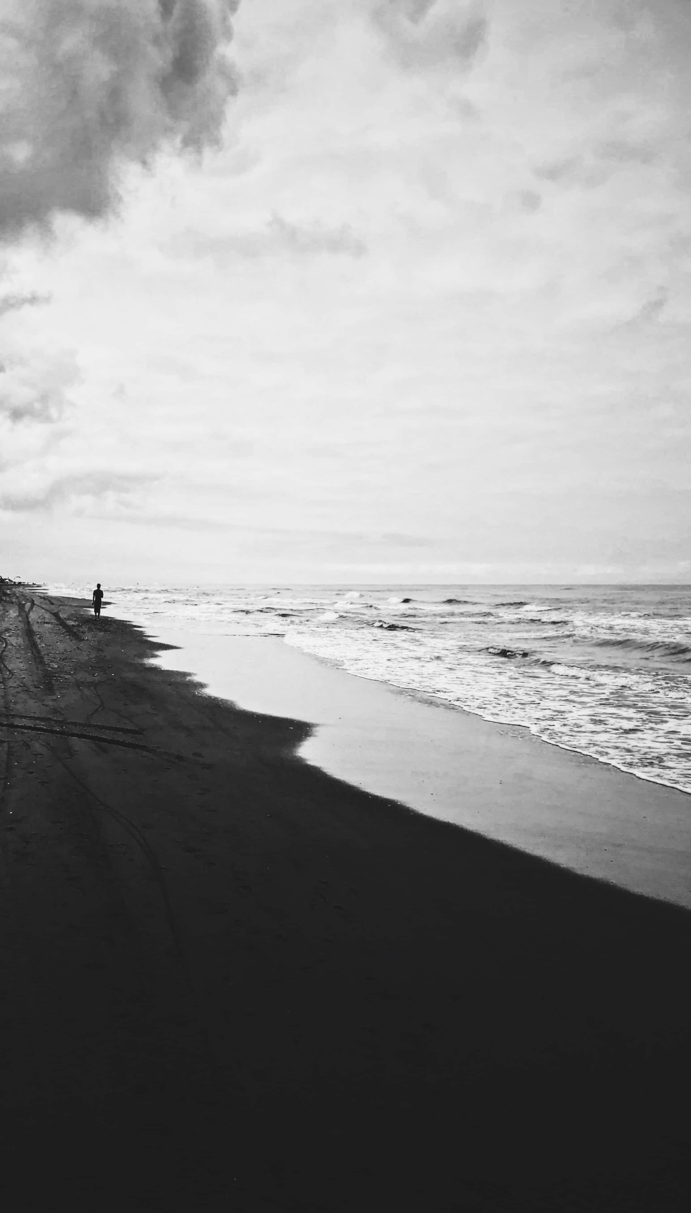 black and white, dark sandy beach, gentle waves, 4K Phone Wallpaper