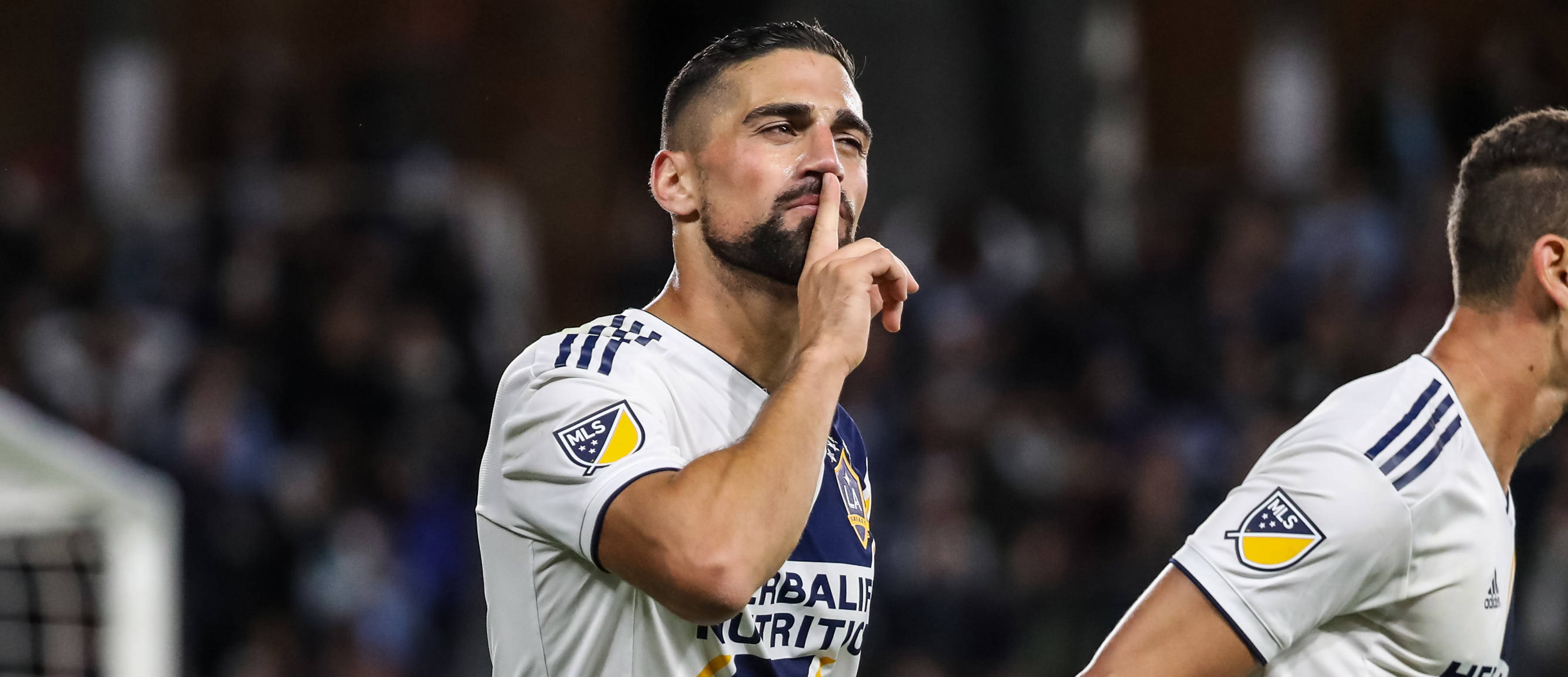 Sebastian Lletget, white jersey, shushing gesture, 2K Desktop Wallpaper