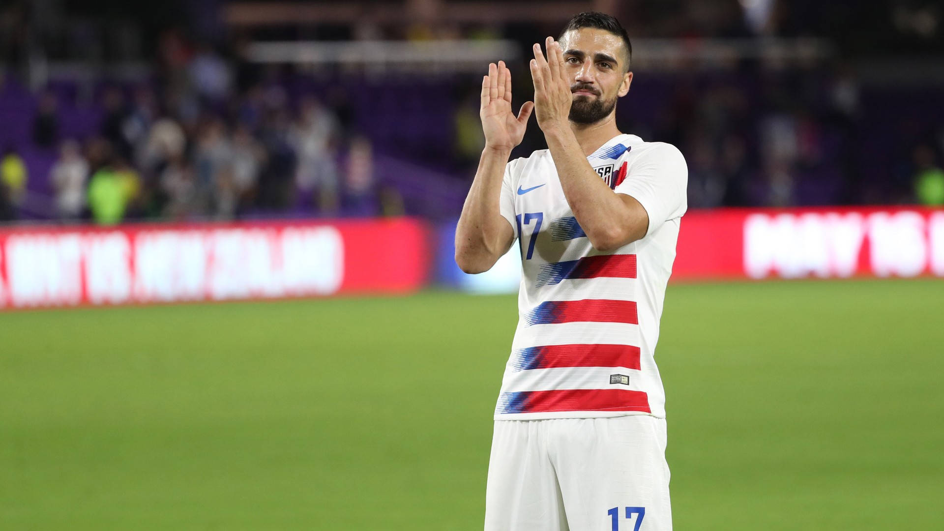 Sebastian Lletget, white jersey with red blue stripes, green field, Full HD Desktop Wallpaper