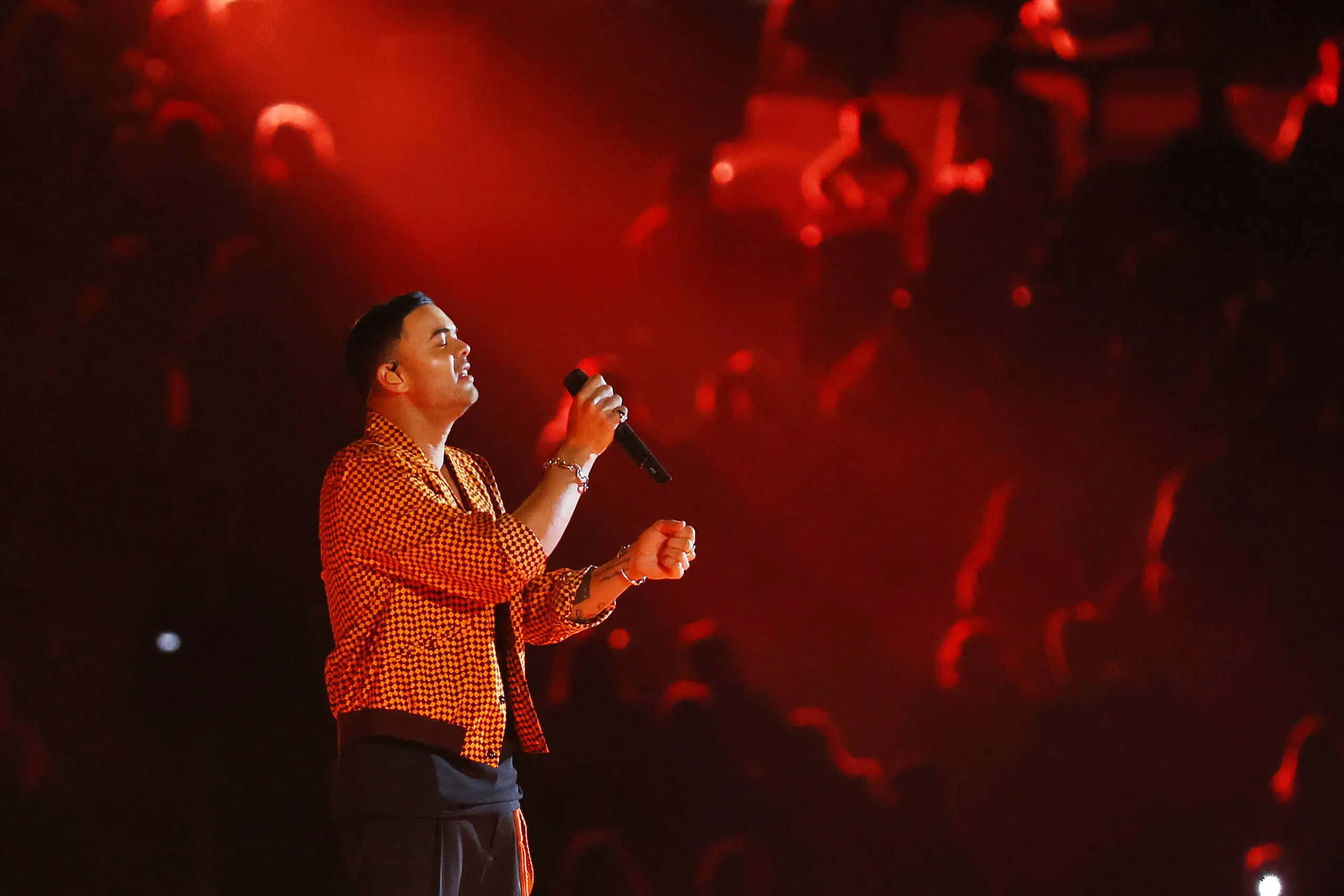 Guy Sebastian, checkered shirt, red lighting, 2K Desktop Wallpaper
