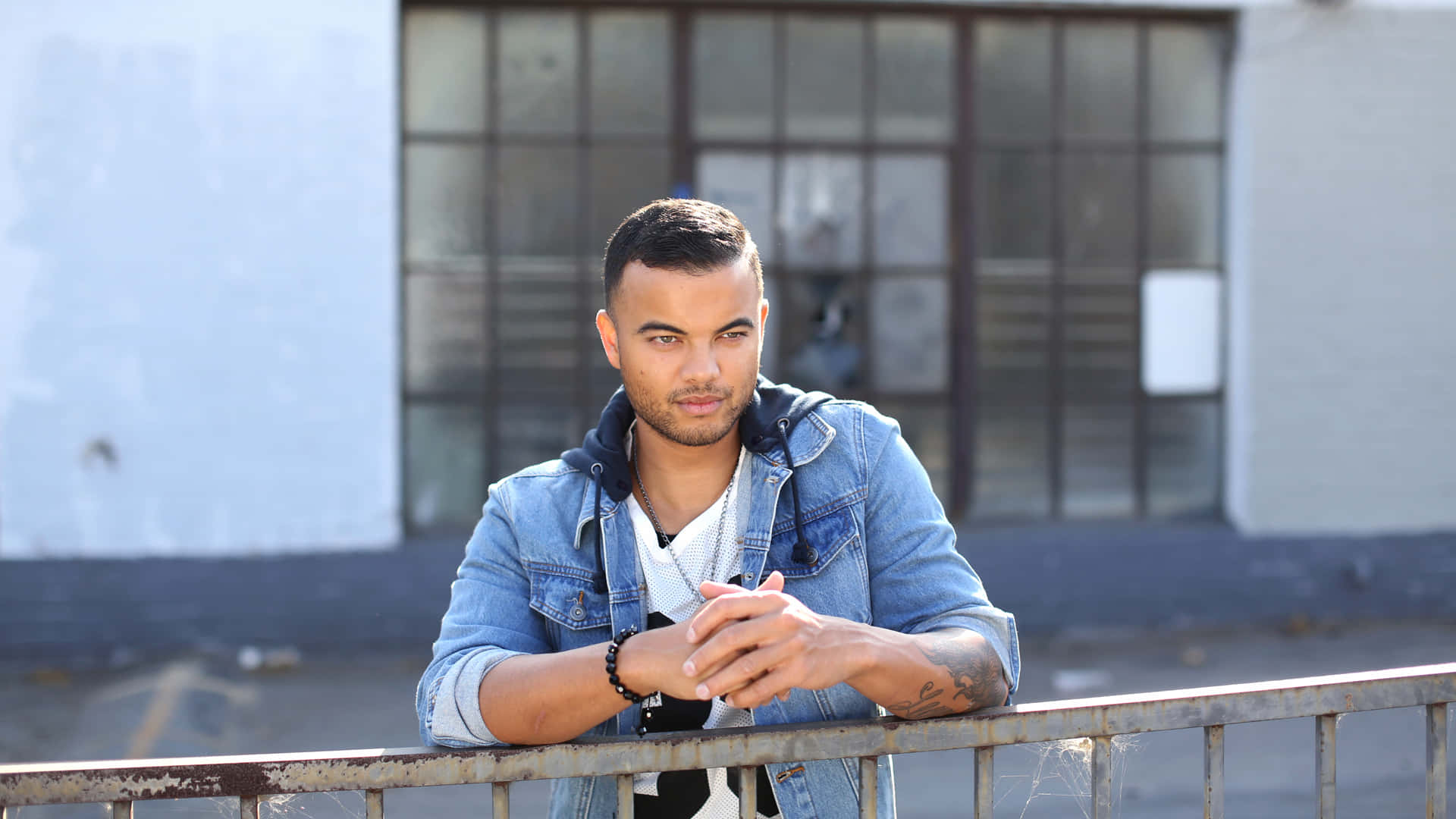 Guy Sebastian, denim jacket, rusty metal railing, Full HD Desktop Wallpaper